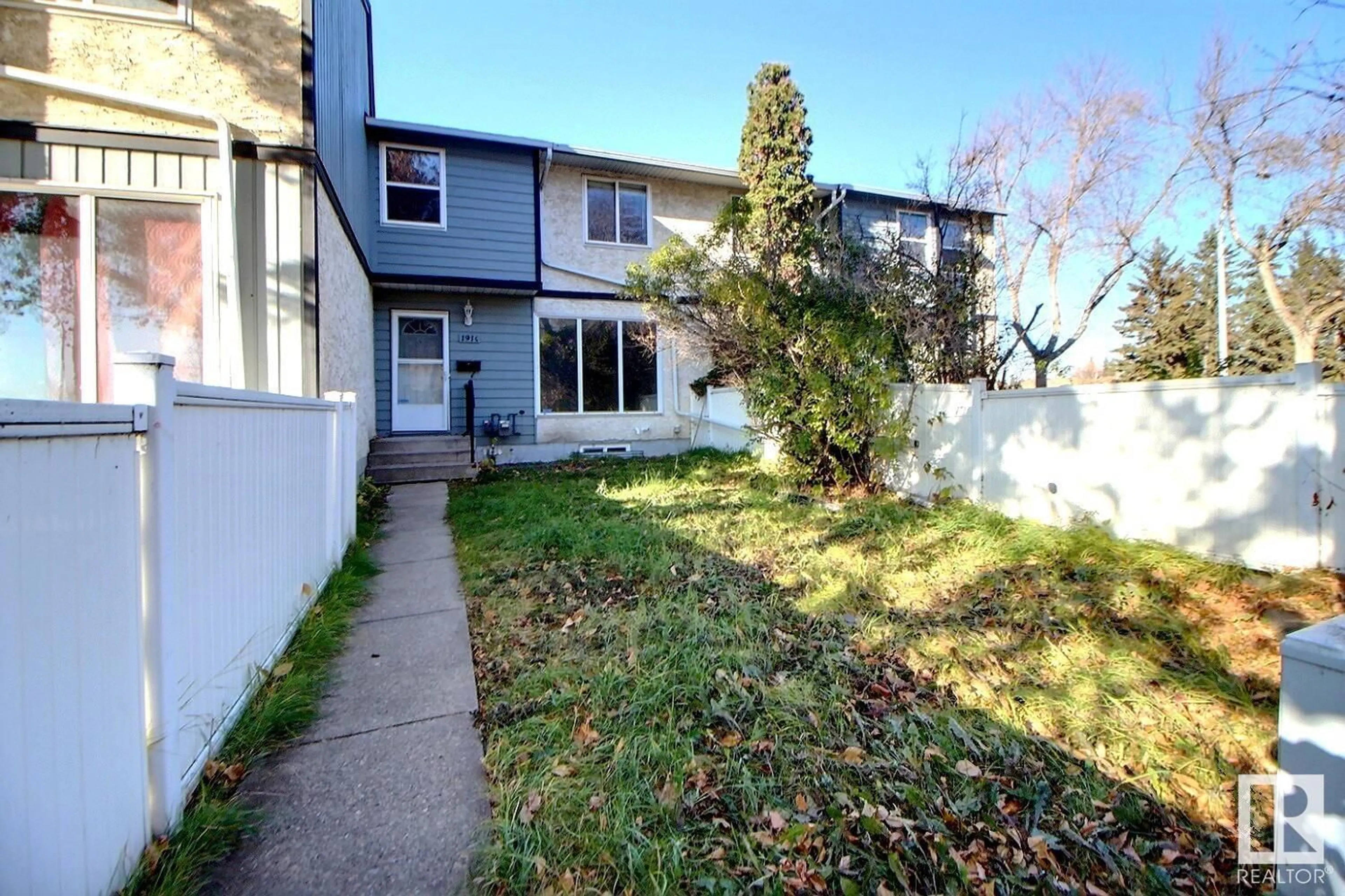 A pic from exterior of the house or condo, the fenced backyard for 191G HOMESTEAD CR NW, Edmonton Alberta T5A2Y2