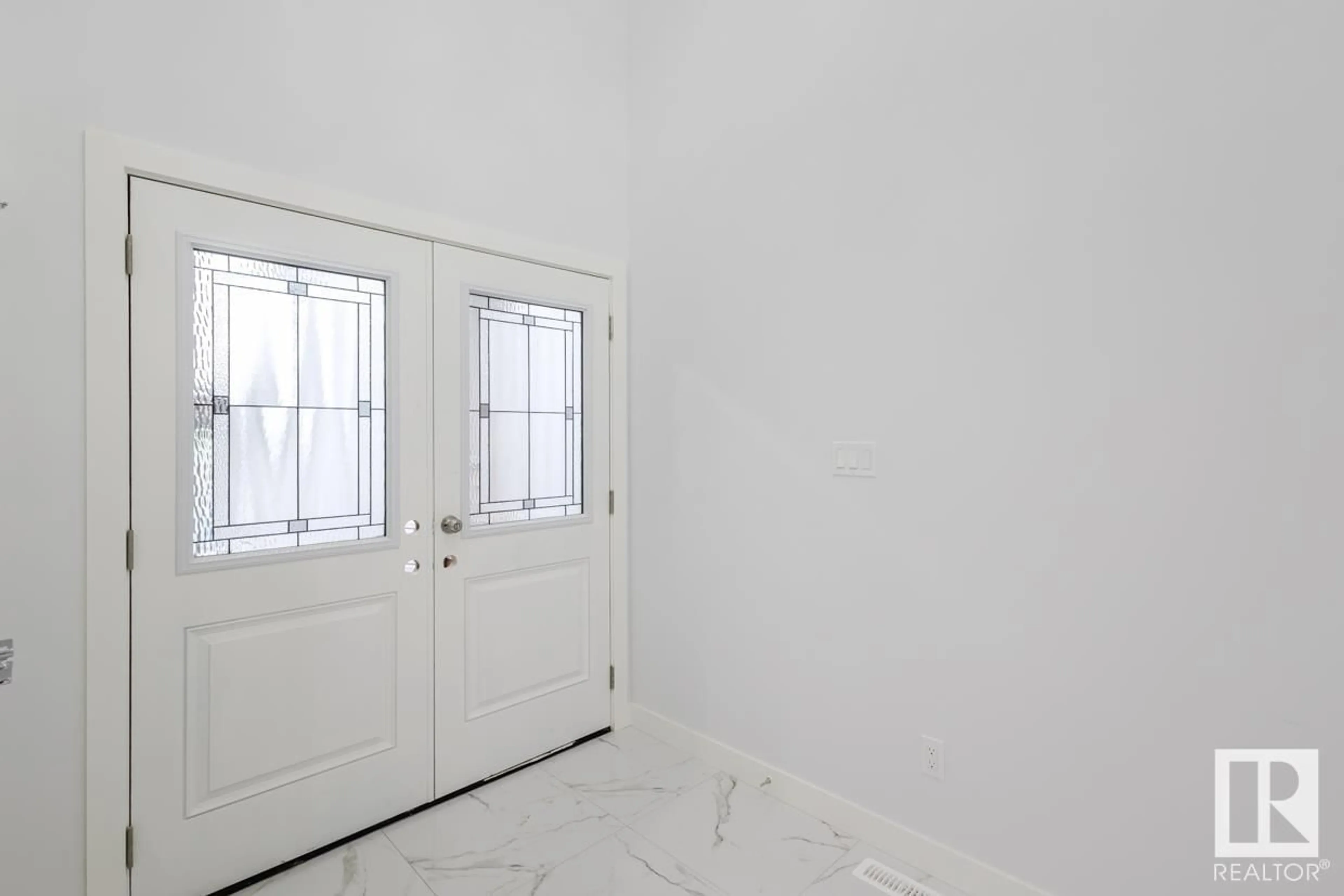 Indoor entryway, not visible floor for 1339 14 AV NW, Edmonton Alberta T6T2S7