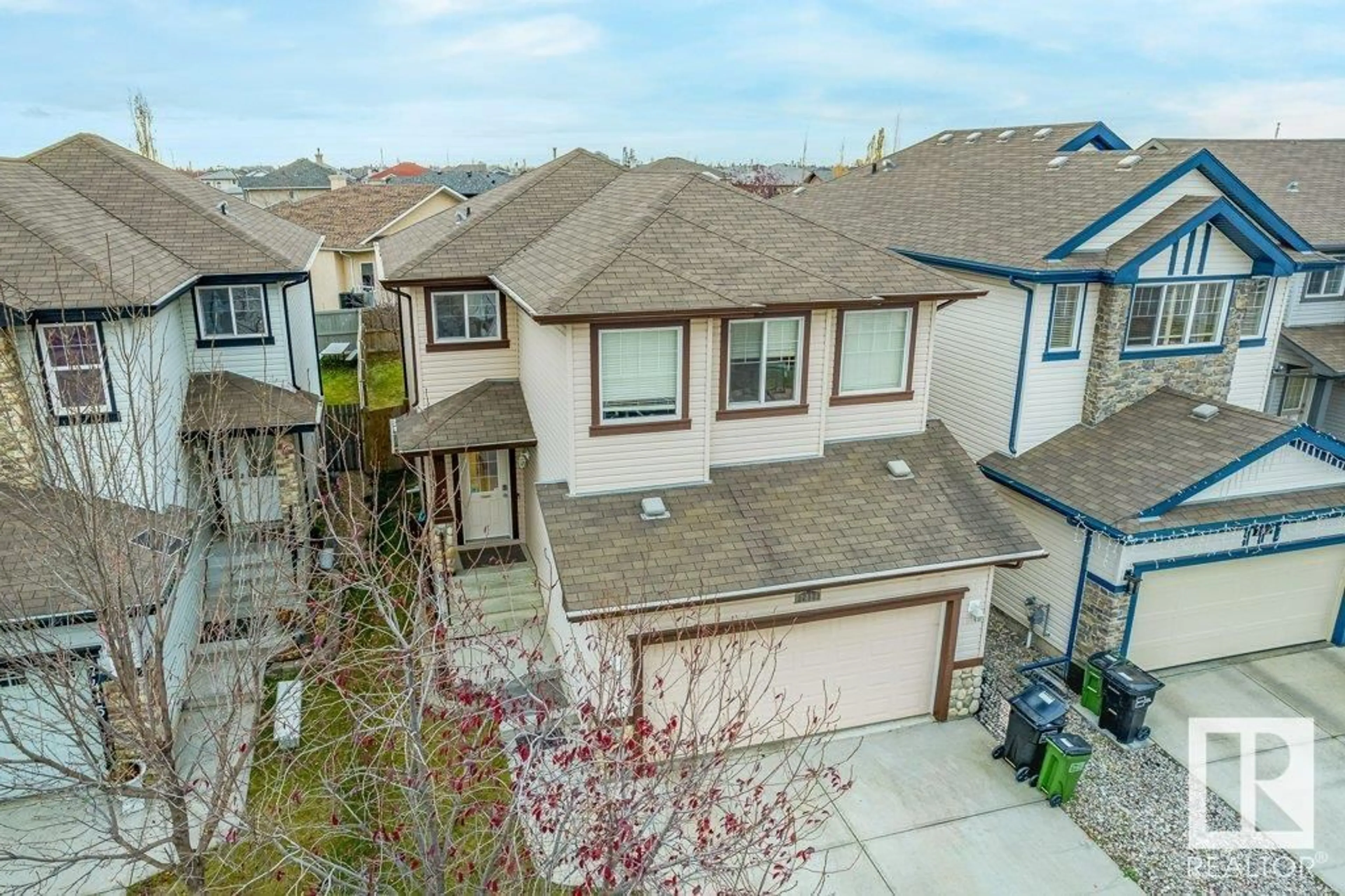 Frontside or backside of a home, the fenced backyard for 7419 170 AV NW, Edmonton Alberta T5Z0B6