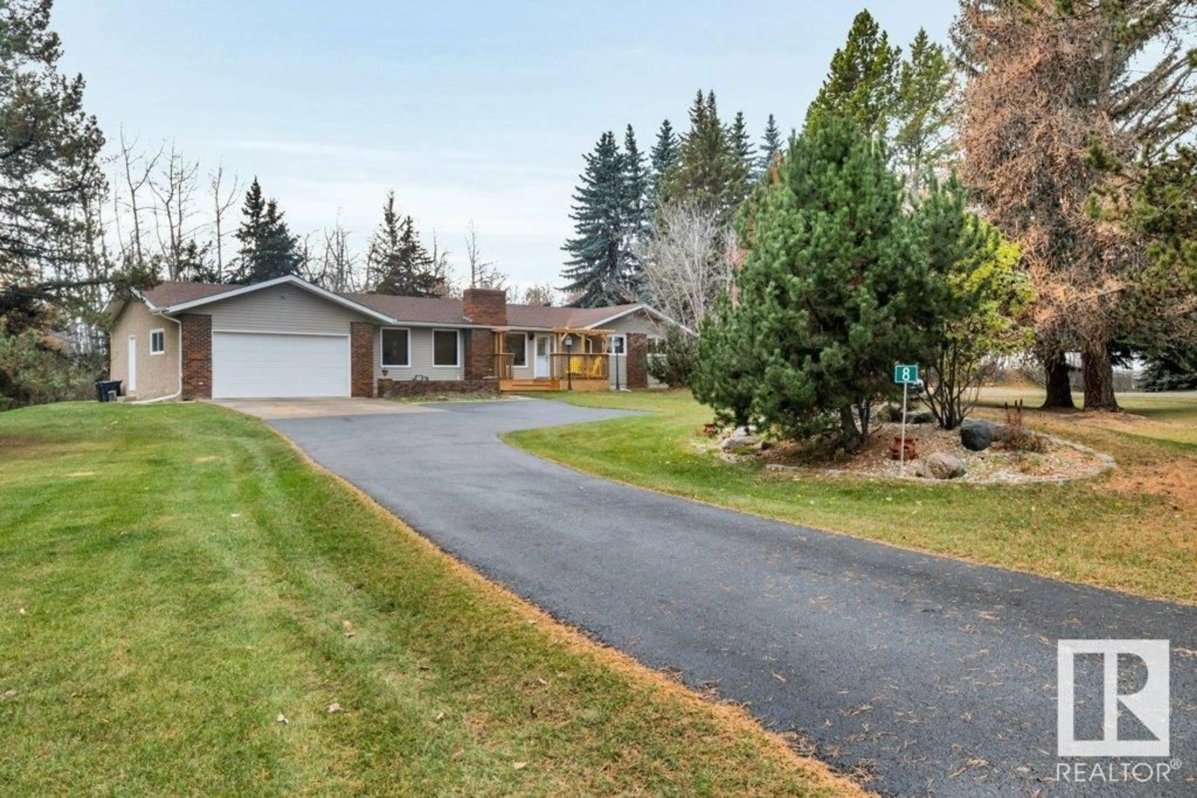 Frontside or backside of a home, the fenced backyard for #8 52212 RGE ROAD 272, Rural Parkland County Alberta T7X3R6