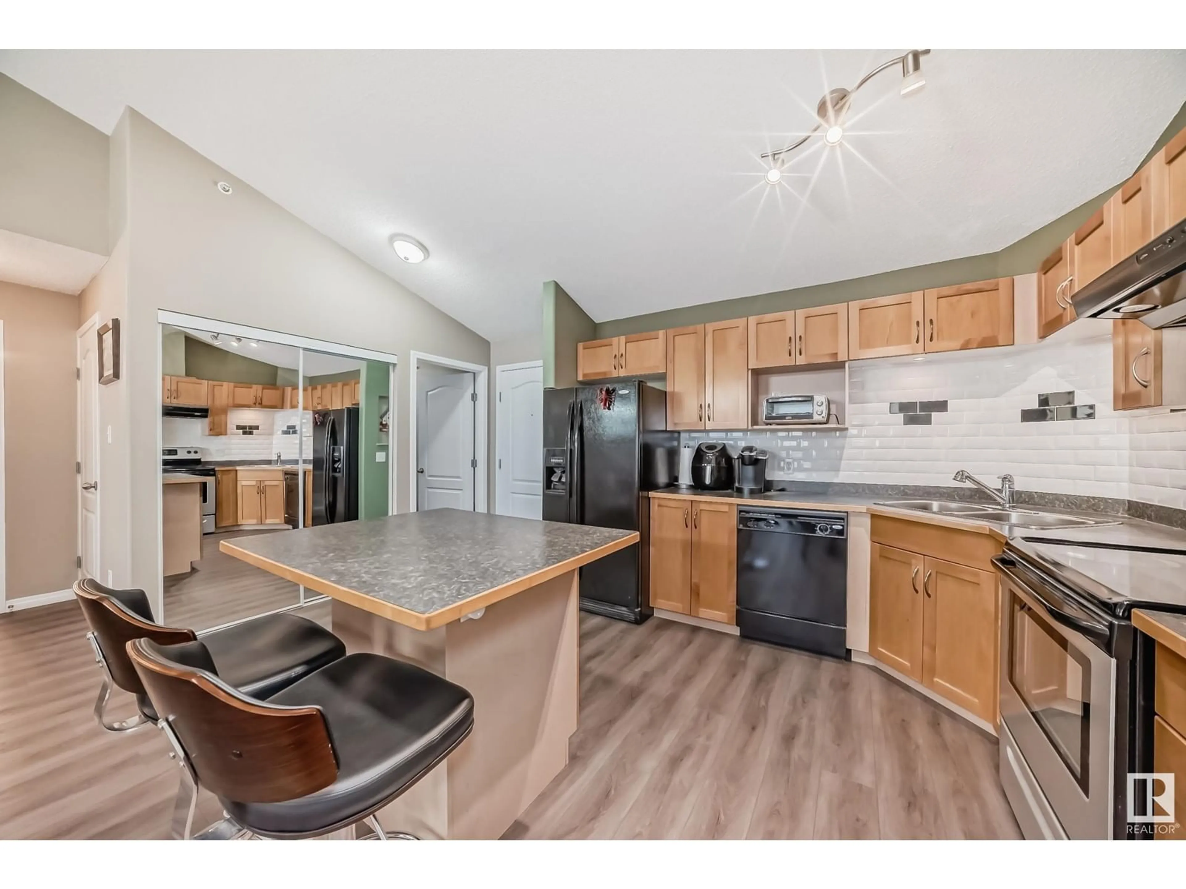 Open concept kitchen for #403 5340 199 ST NW, Edmonton Alberta T6M0A5