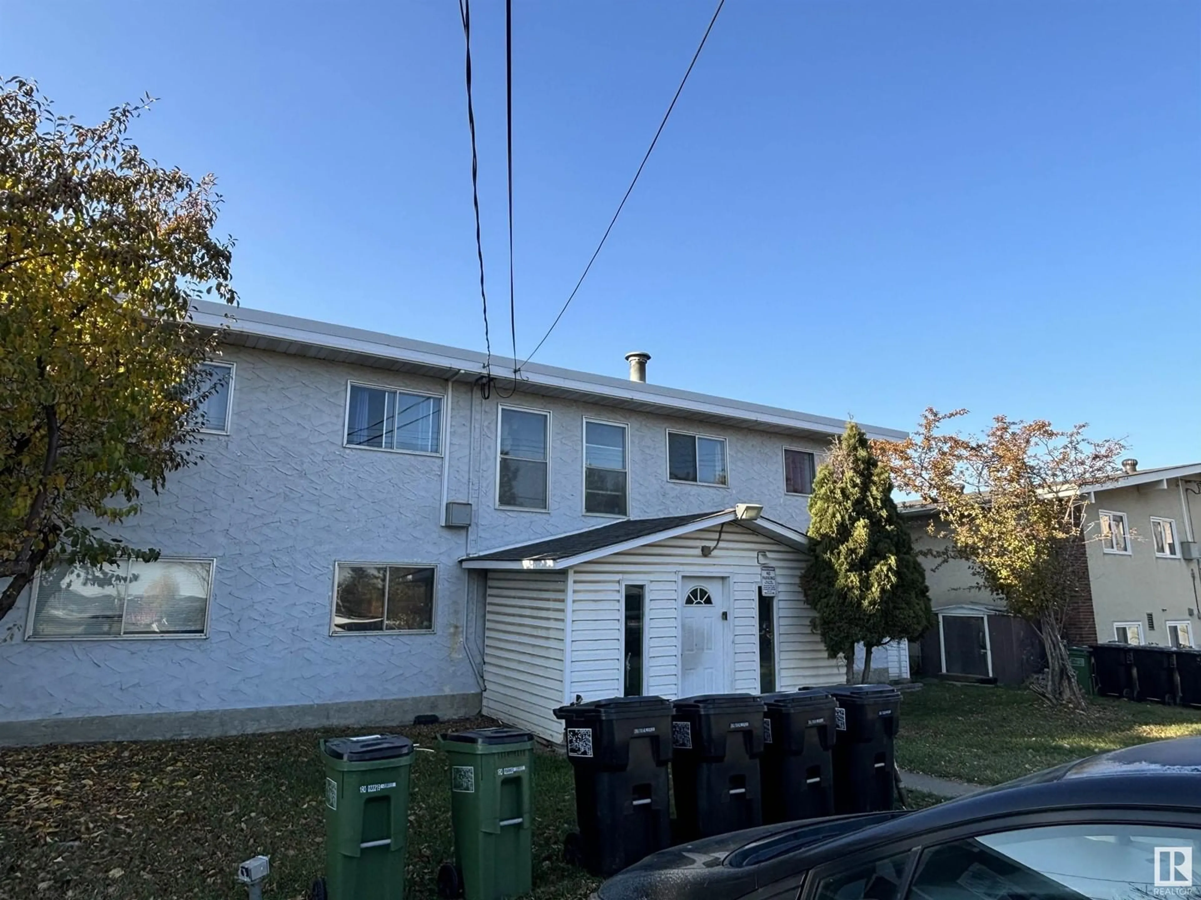 Frontside or backside of a home, the front or back of building for 7723 75 ST NW, Edmonton Alberta T6C2G2