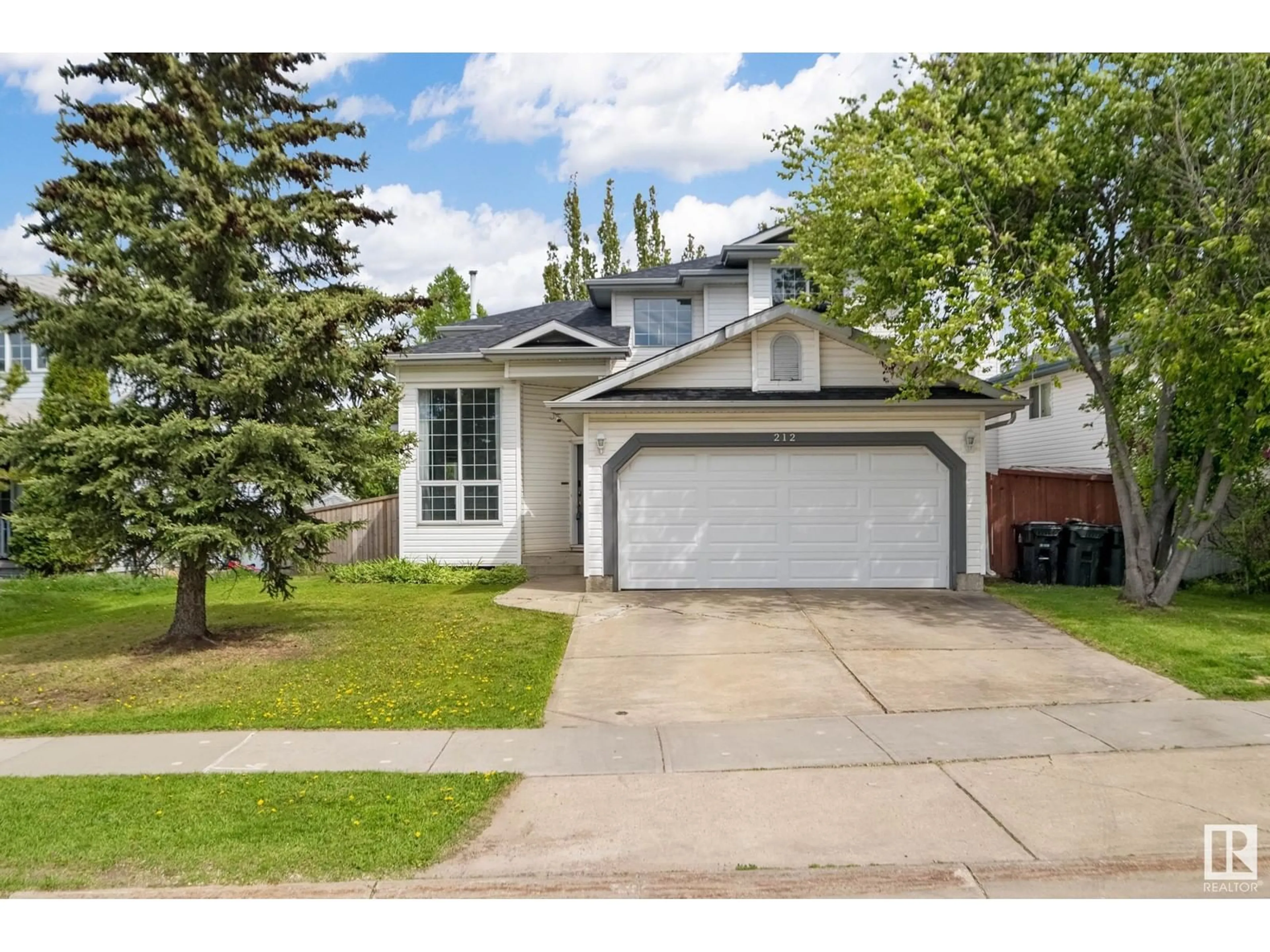 Frontside or backside of a home, the street view for 212 LAKELAND DR, Spruce Grove Alberta T7X3W7