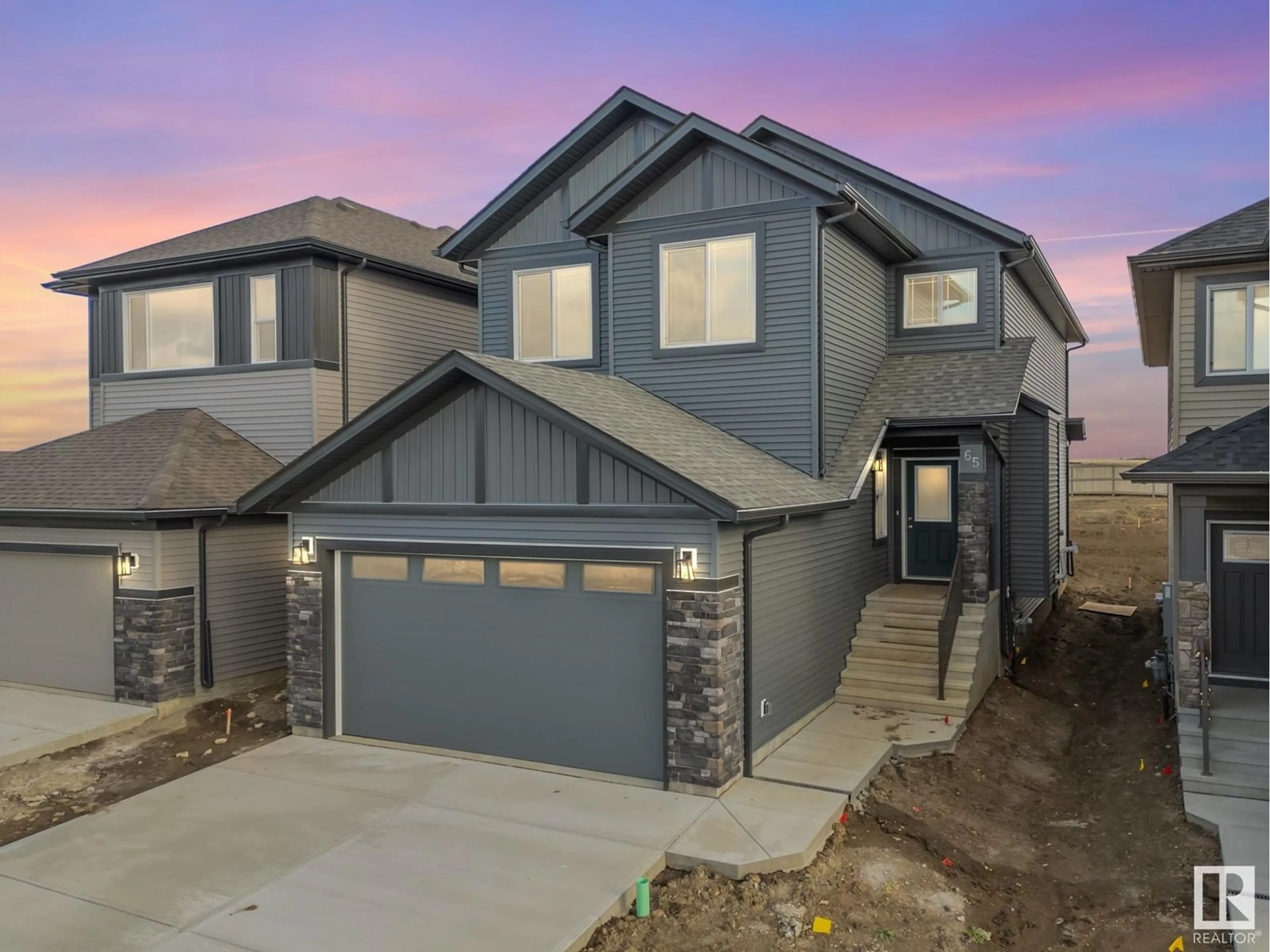 Frontside or backside of a home, the street view for 65 BAKER ST, Ardrossan Alberta T8E0B6