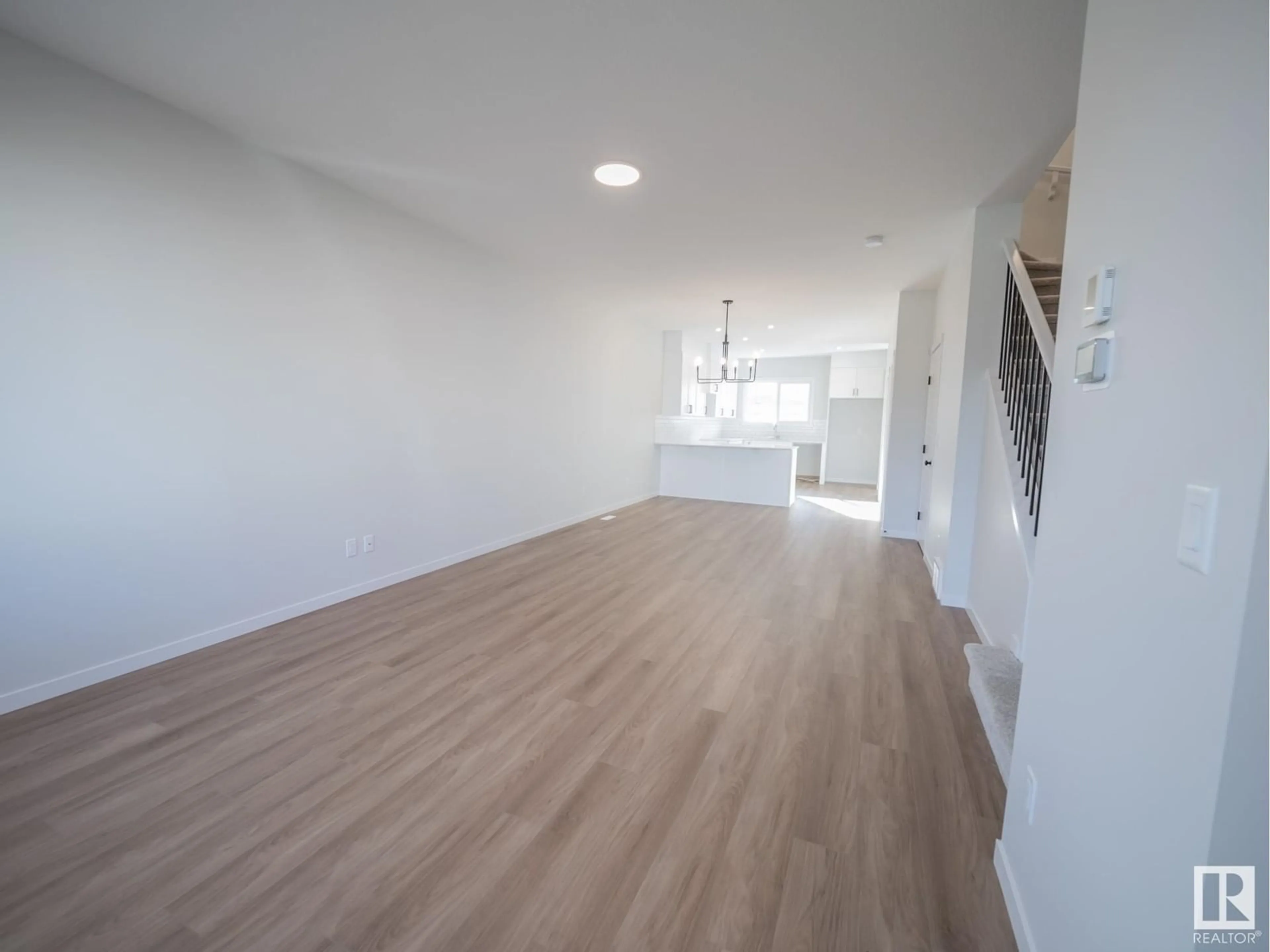 A pic of a room, wood floors for 9324 229 ST NW, Edmonton Alberta T5T4W8