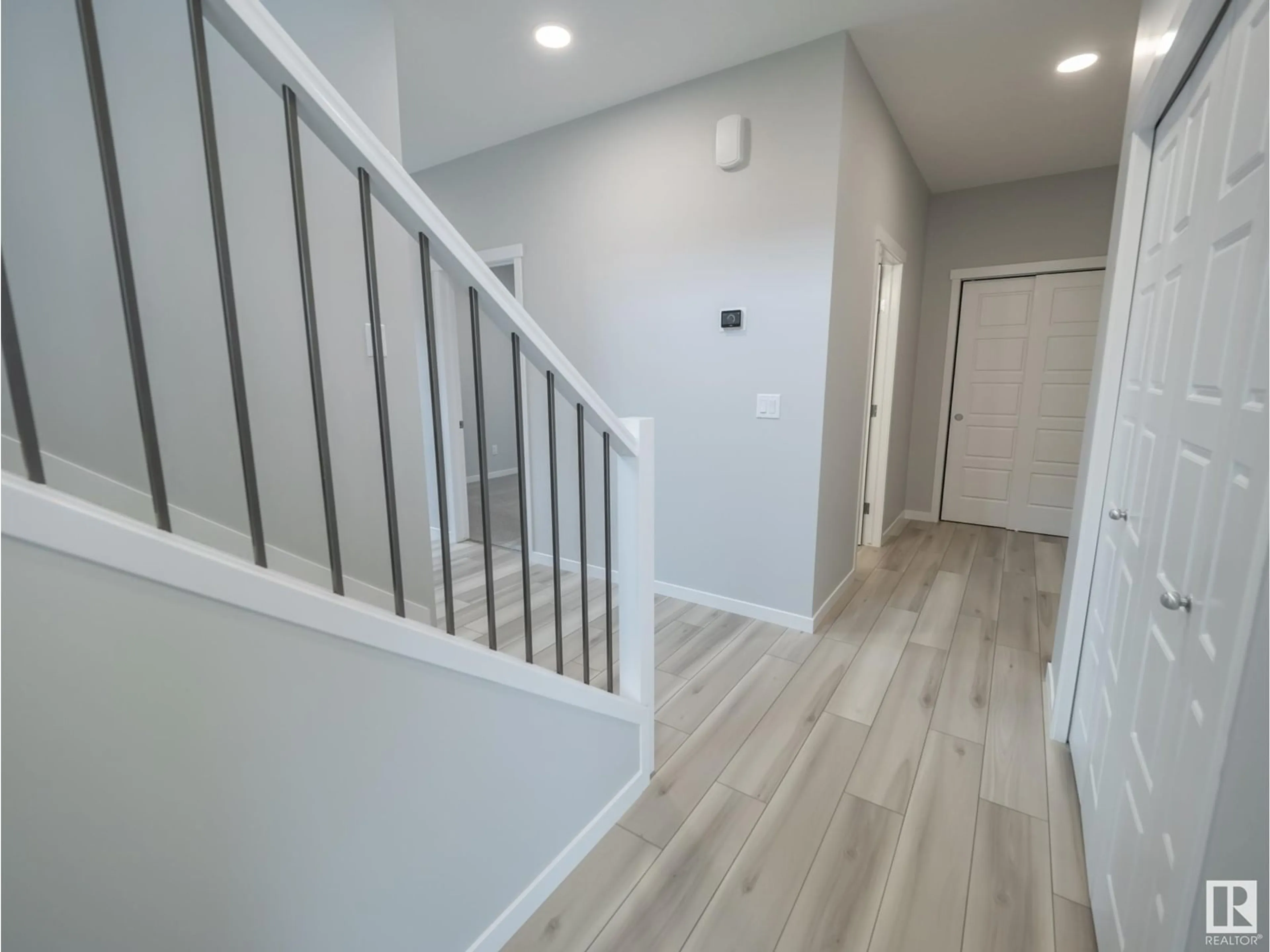 Indoor entryway, wood floors for 2520 209 ST NW, Edmonton Alberta T6M2K7