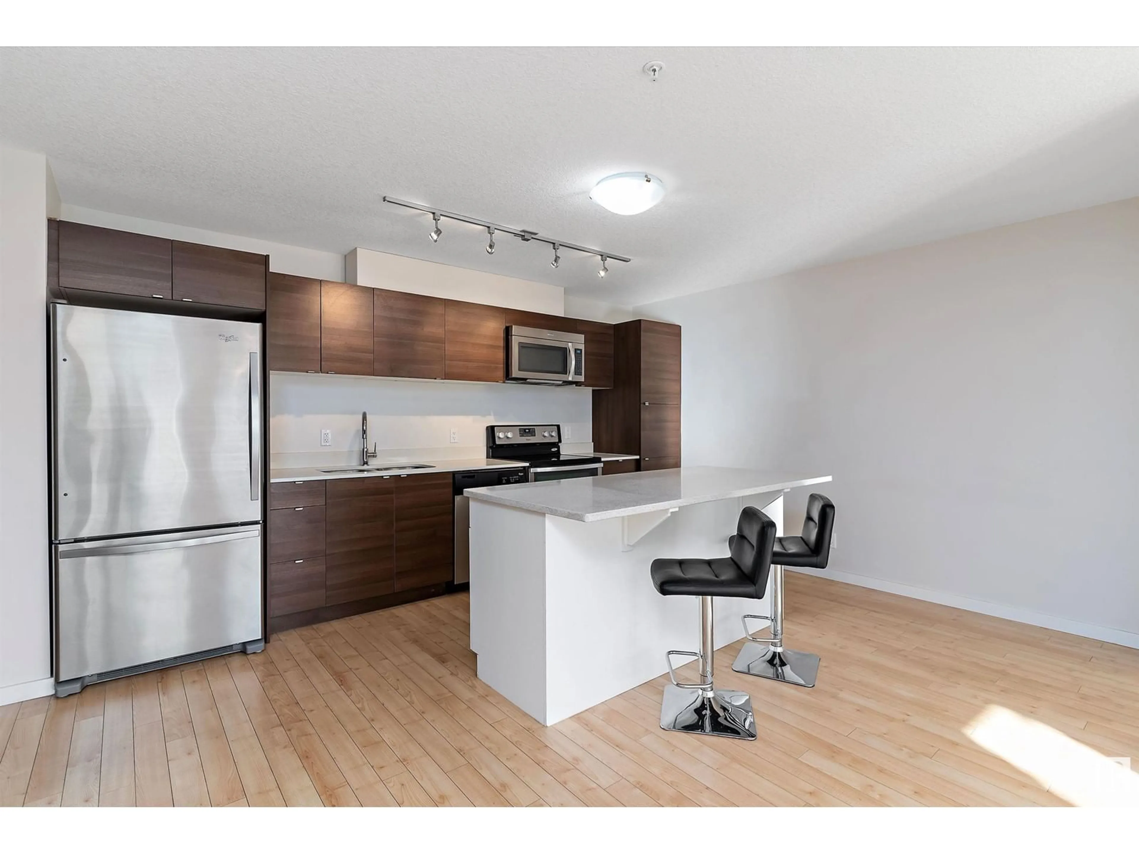 Standard kitchen, wood floors for #203 9523 160 AV NW, Edmonton Alberta T5Z0N1