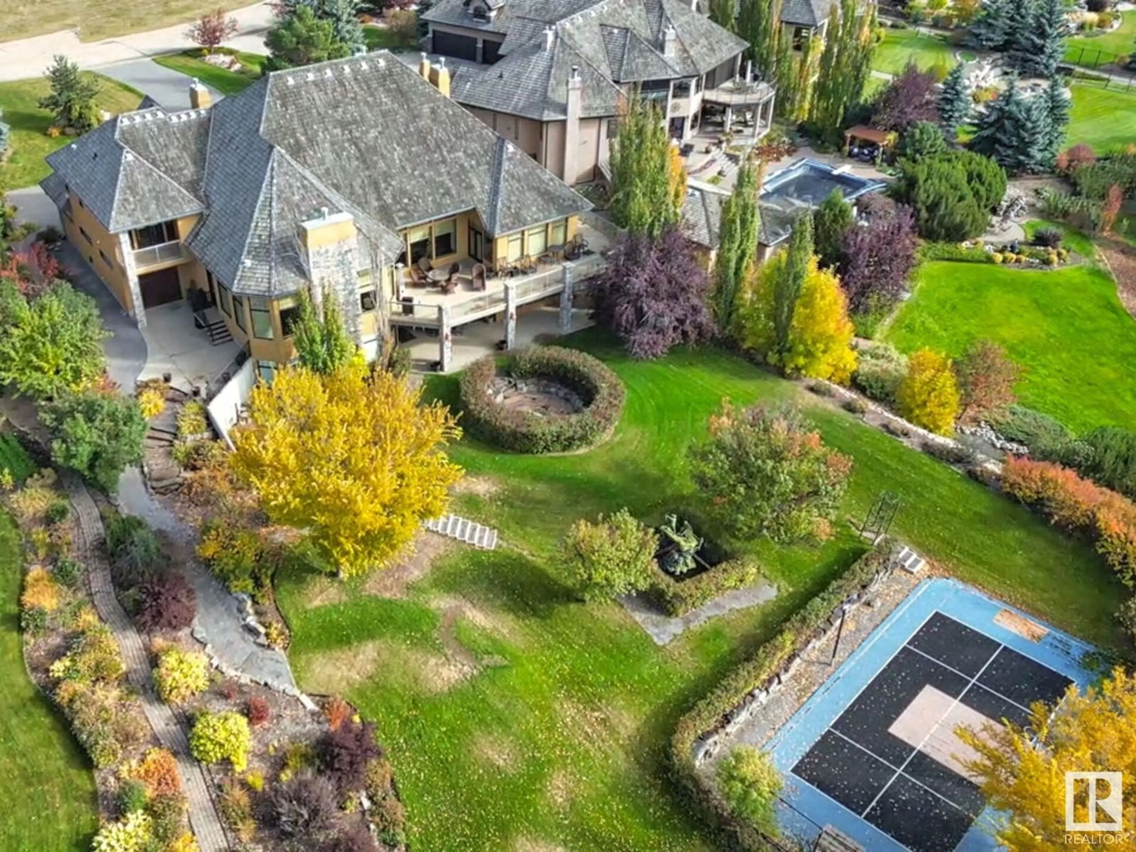 A pic from outside/outdoor area/front of a property/back of a property/a pic from drone, water/lake/river/ocean view for 37 RIVERRIDGE ROAD, Rural Sturgeon County Alberta T8T0B9