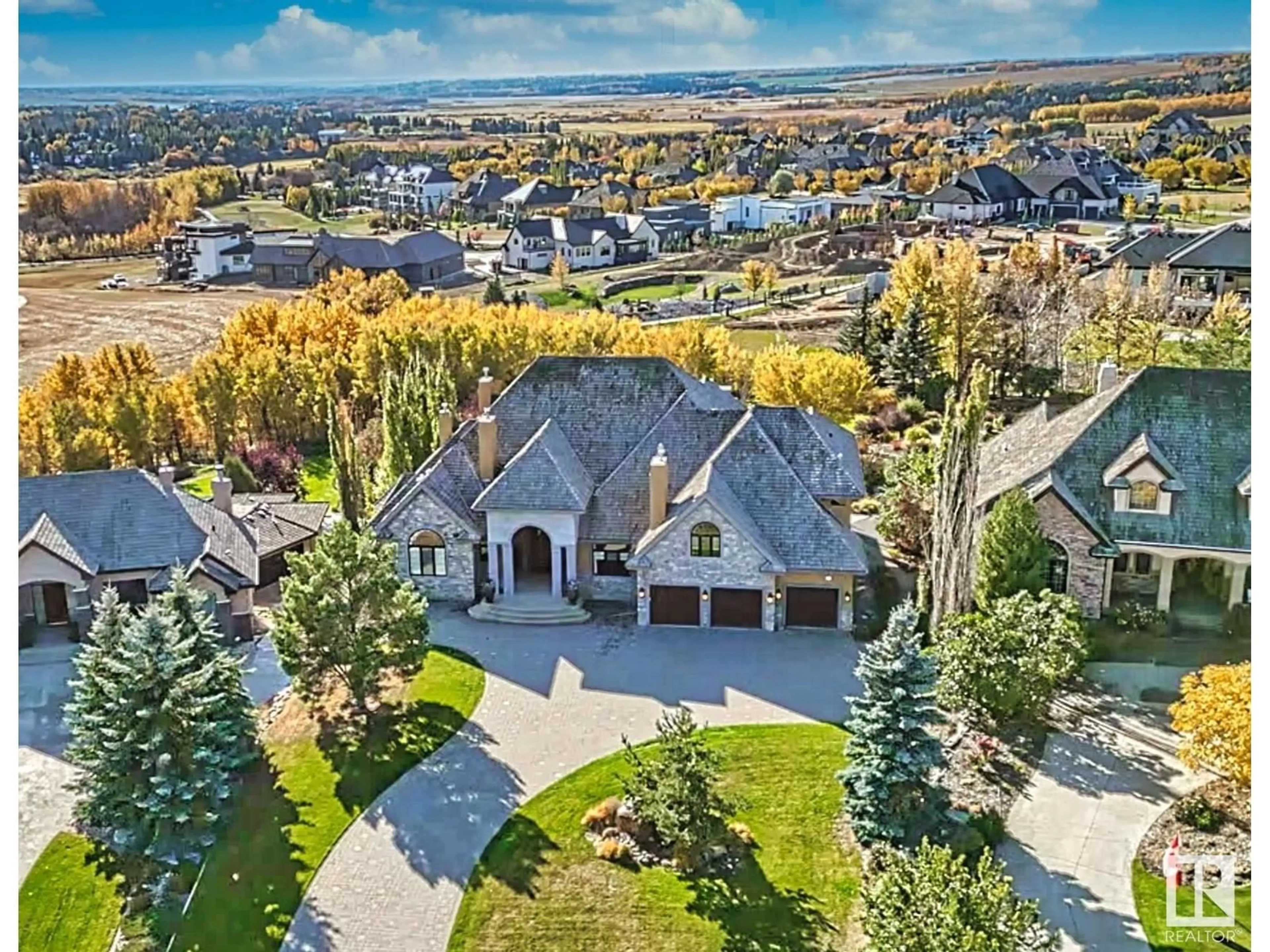 Frontside or backside of a home, the street view for 37 Riverridge Road, Rural Sturgeon County Alberta T8T0B9