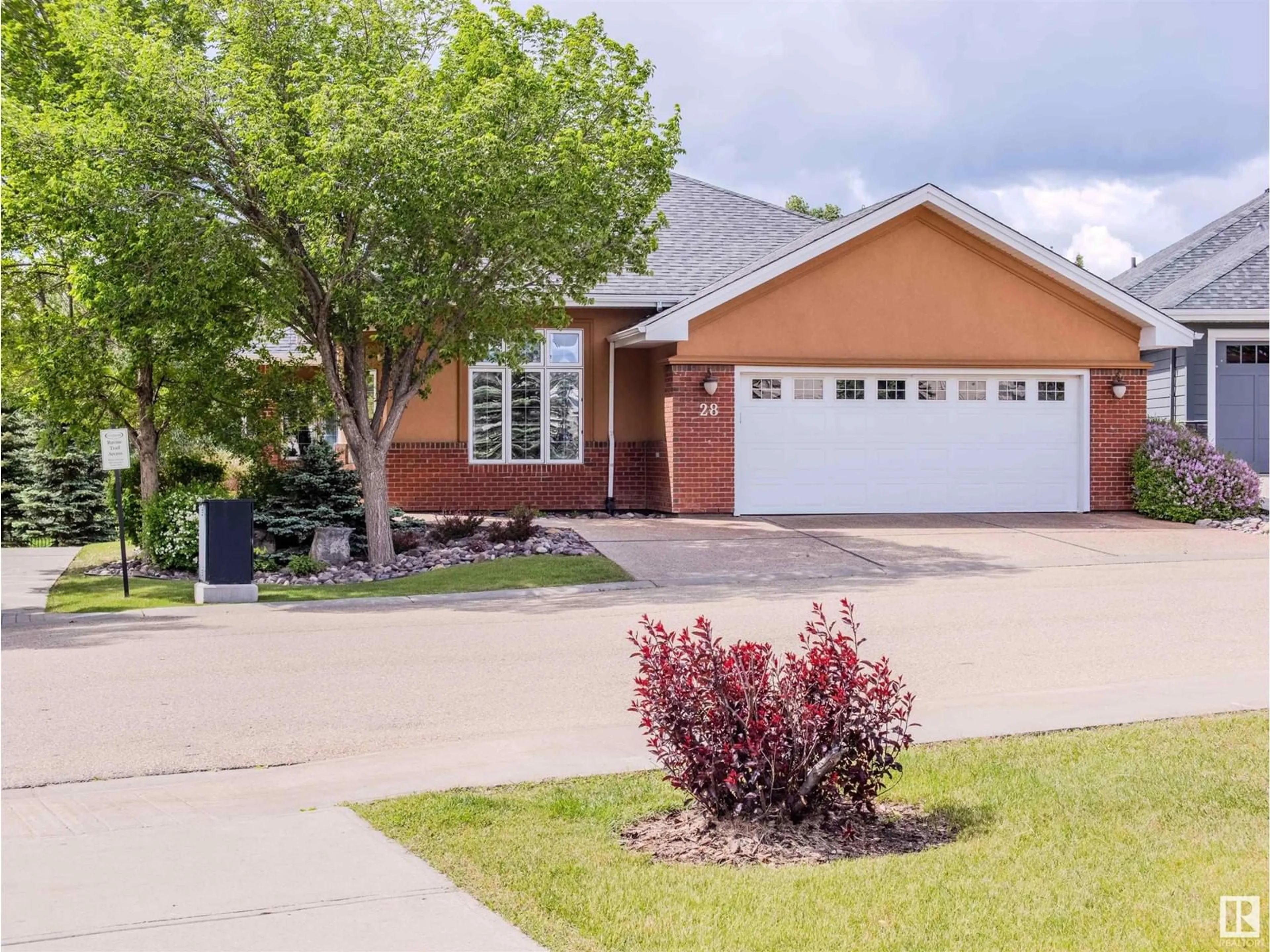 Frontside or backside of a home, the street view for #28 18343 LESSARD RD NW, Edmonton Alberta T6M0A2