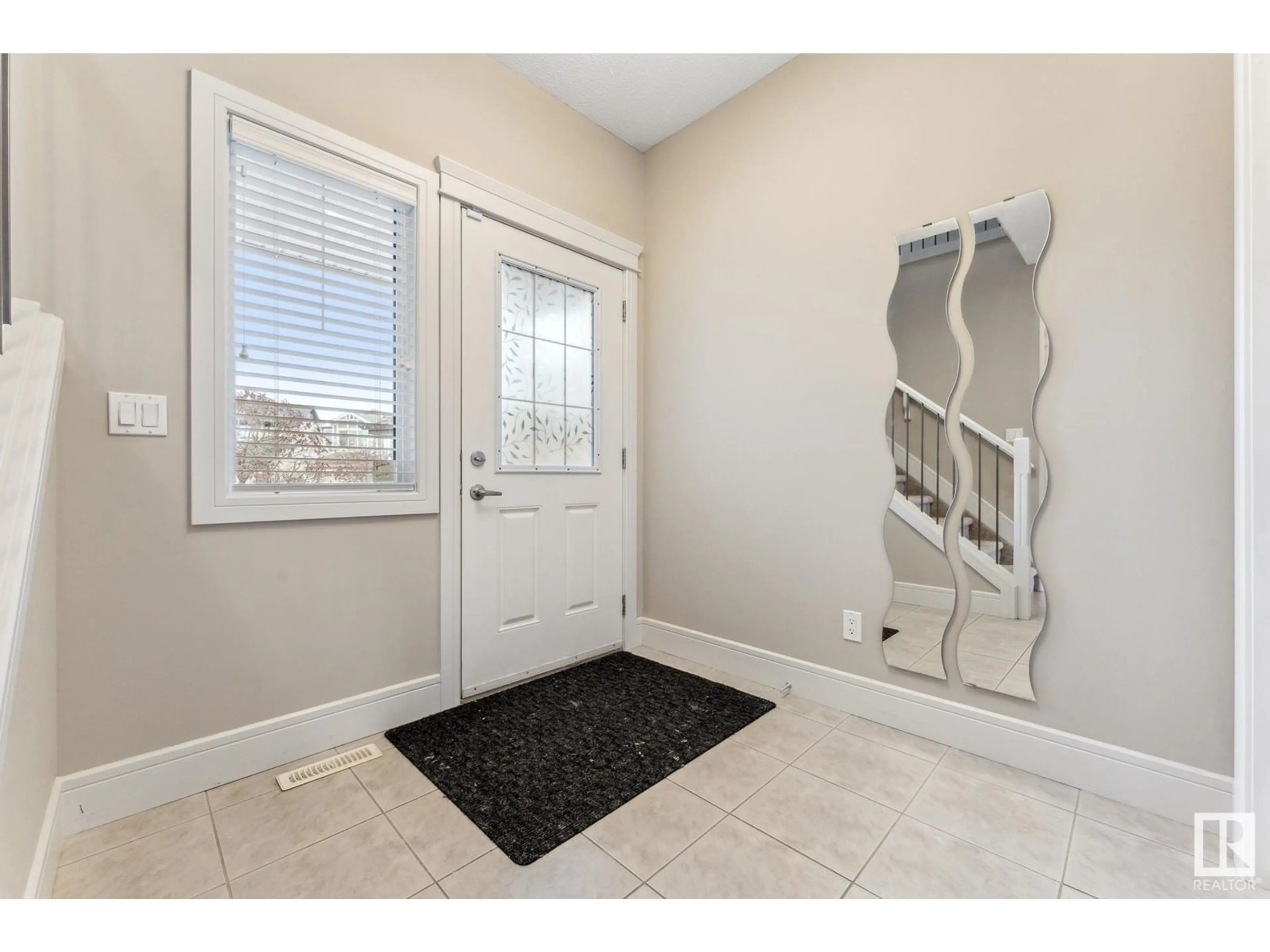 Indoor entryway, wood floors for 3915 AGAR CO SW, Edmonton Alberta T6W2G3