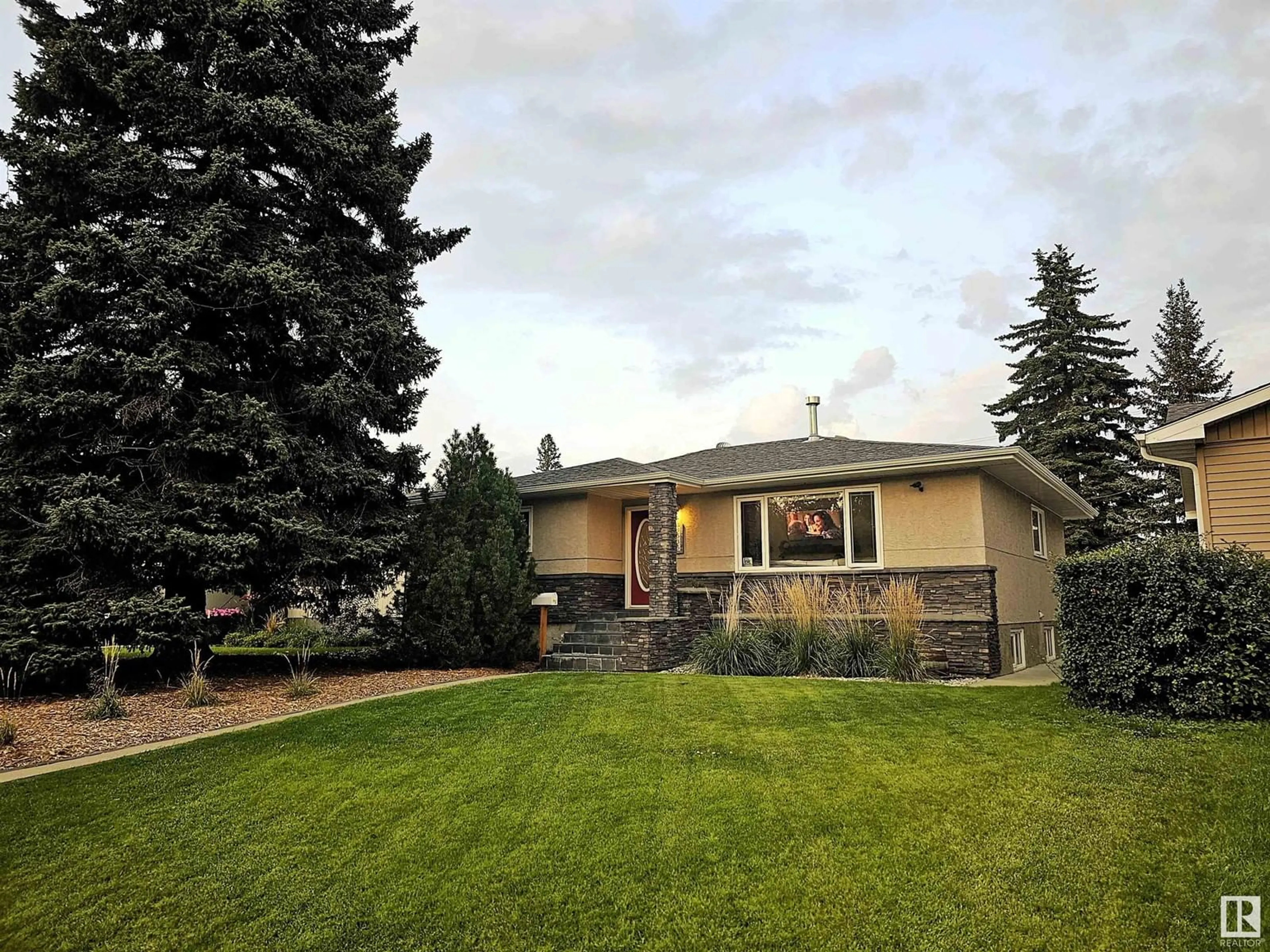 Frontside or backside of a home, the fenced backyard for 9535 148 ST NW, Edmonton Alberta T5N3E3