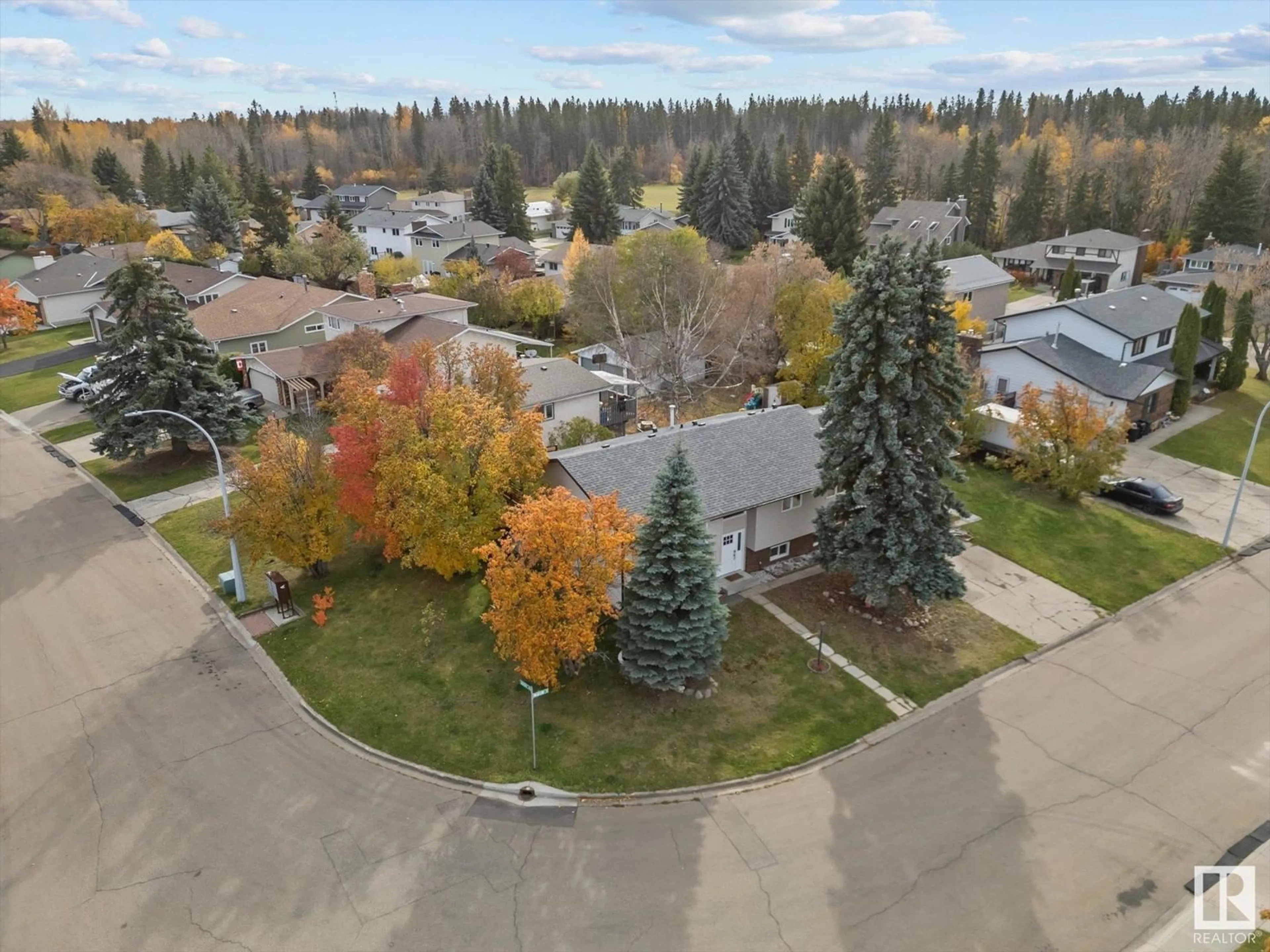 A pic from exterior of the house or condo, the fenced backyard for 4 MADISON ST, Spruce Grove Alberta T7X2N6