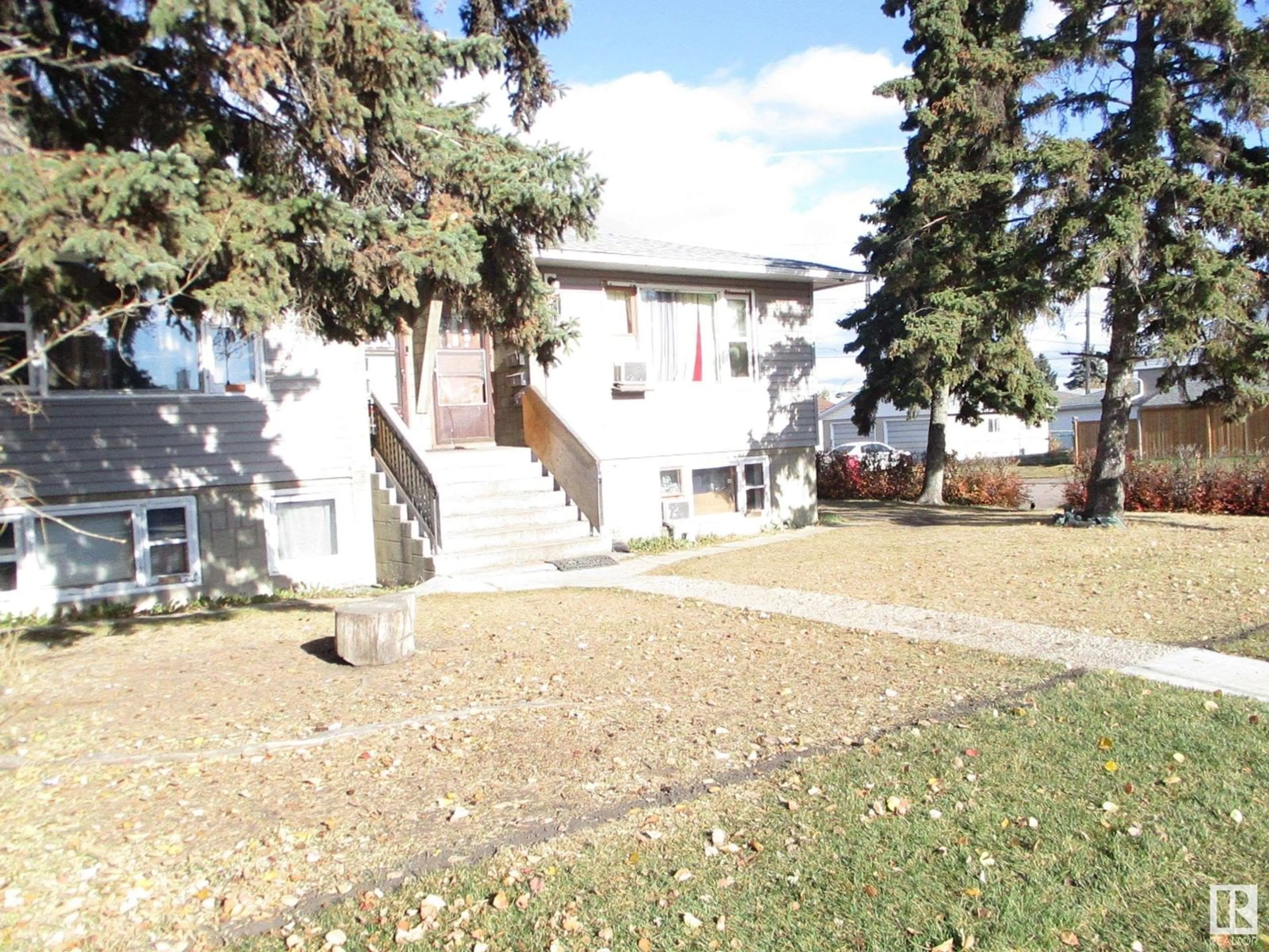 A pic from exterior of the house or condo, the front or back of building for 6418 132 AV NW NW, Edmonton Alberta T5A0J8