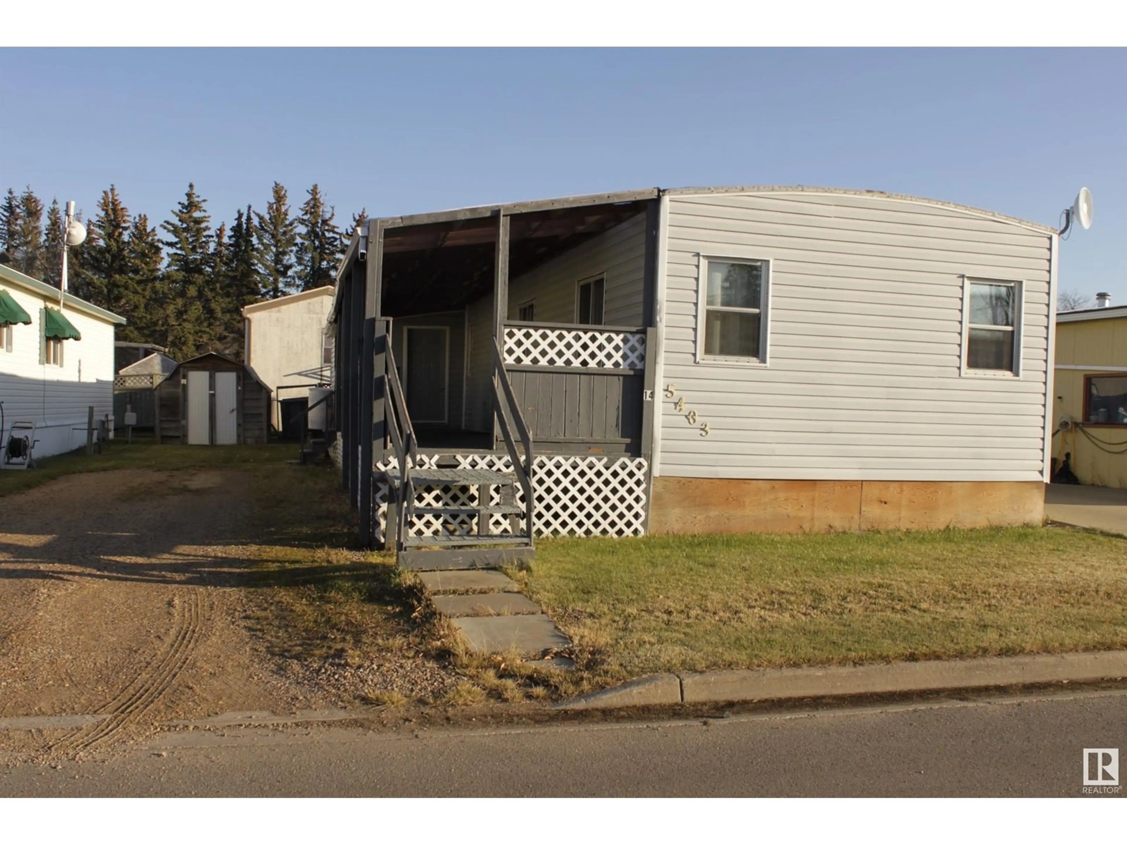 Frontside or backside of a home, cottage for #14 5403 52A St, Tofield Alberta T0B4J0