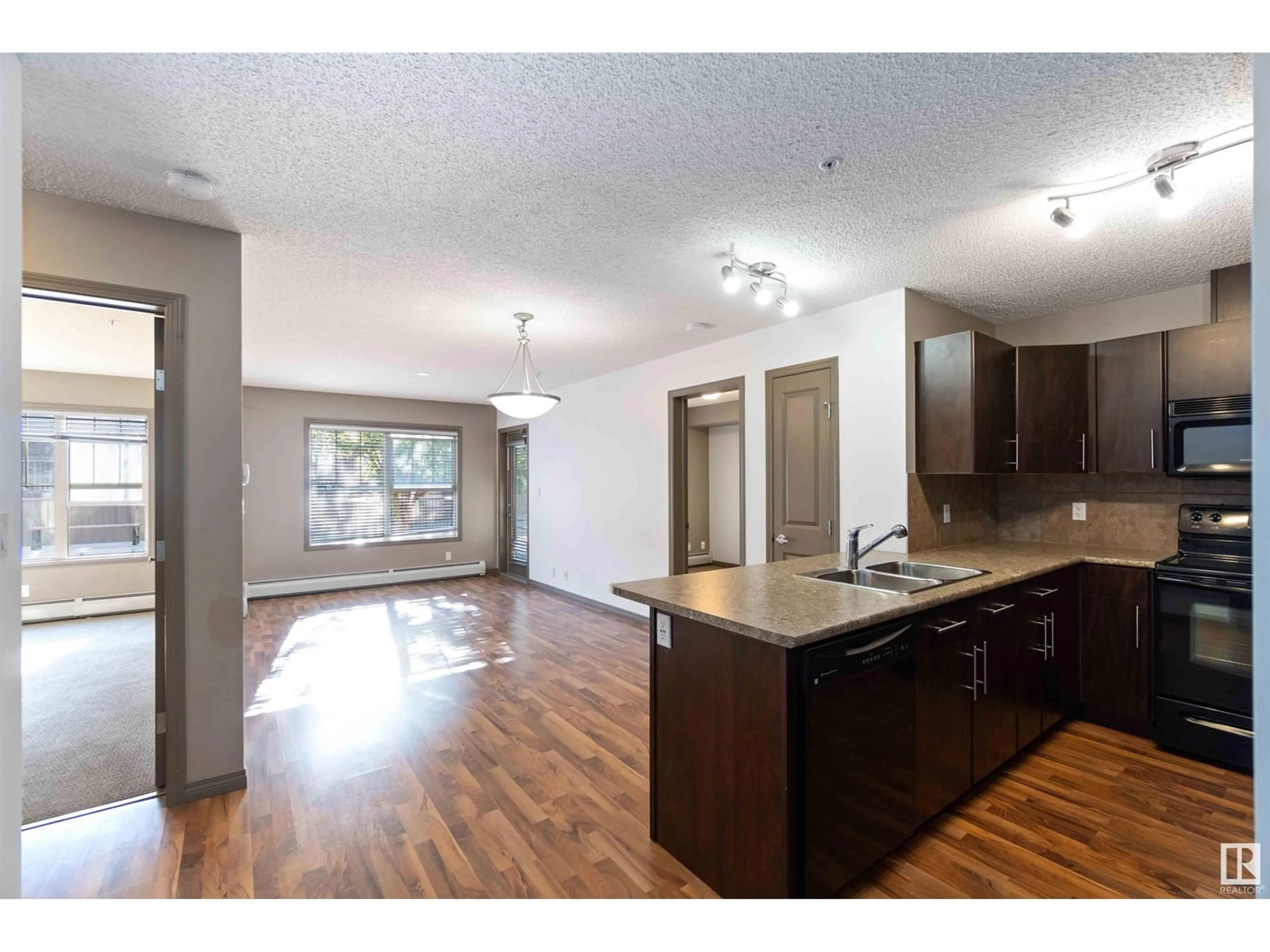 Open concept kitchen for #104 103 ambleside DR SW, Edmonton Alberta T6W0J4