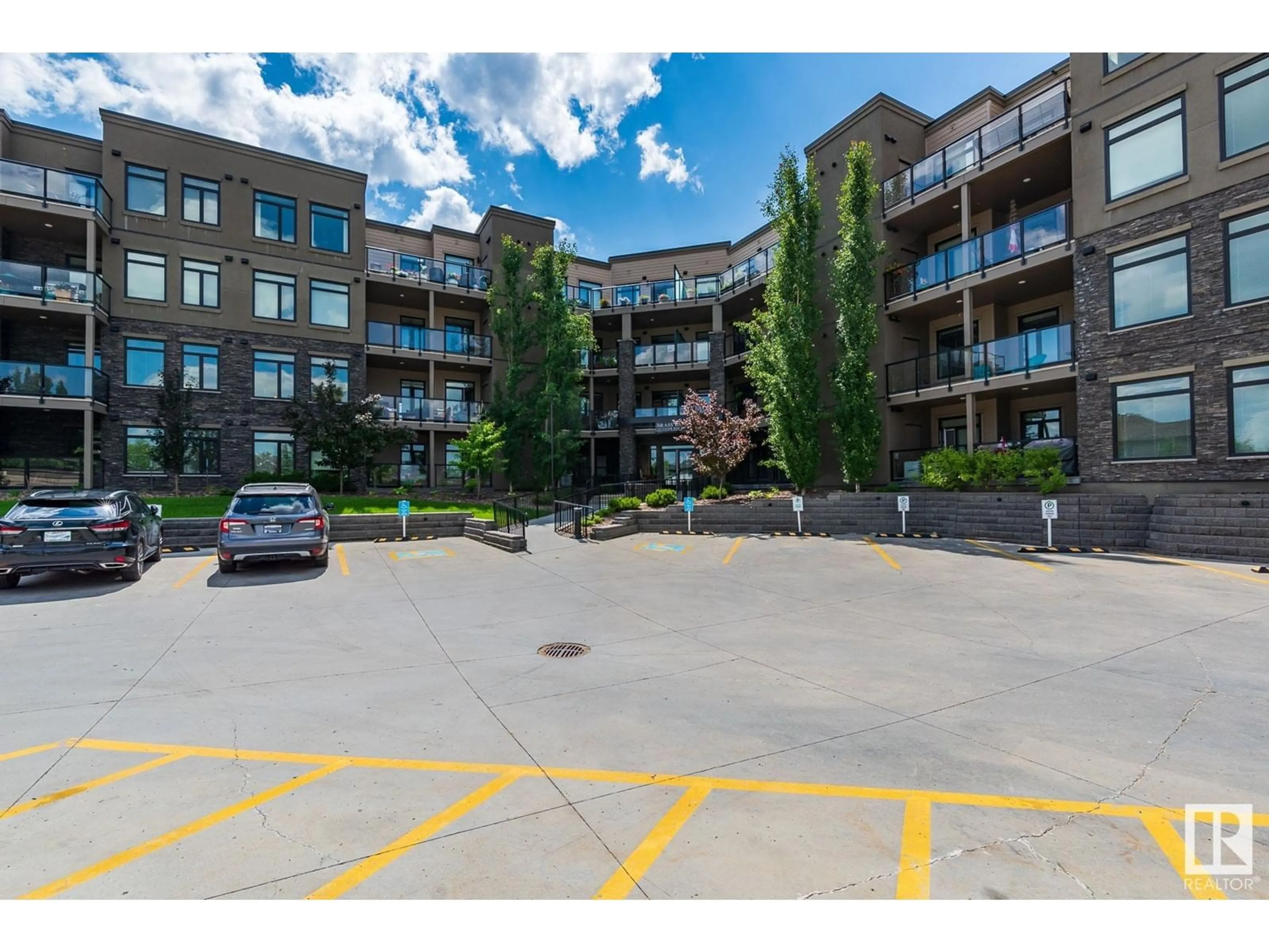 A pic from exterior of the house or condo, the street view for #112 625 LEGER WY NW, Edmonton Alberta T6R0W4