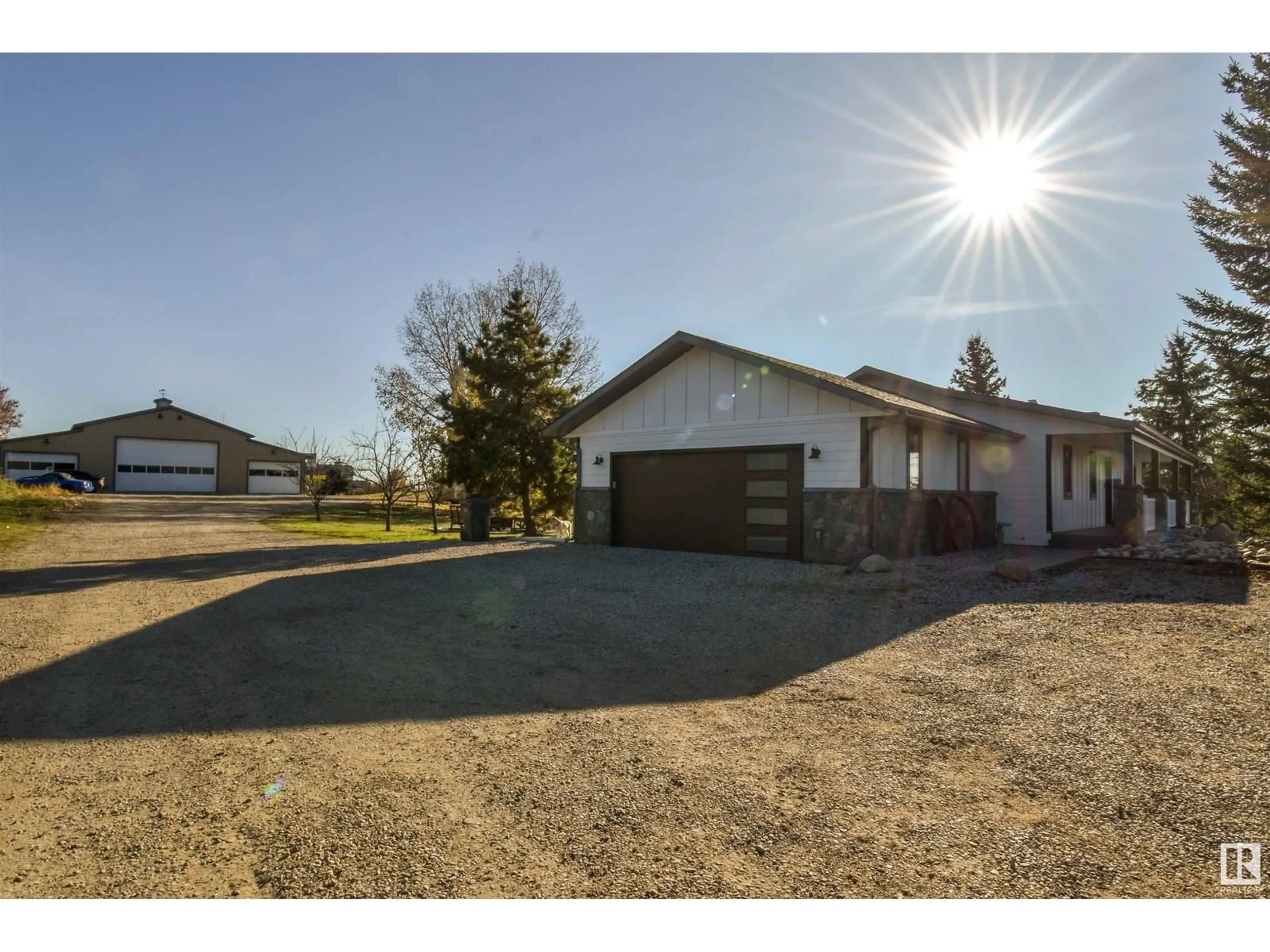 Frontside or backside of a home, the fenced backyard for 27 53302 Rge Rd 12, Rural Parkland County Alberta T7X0B9