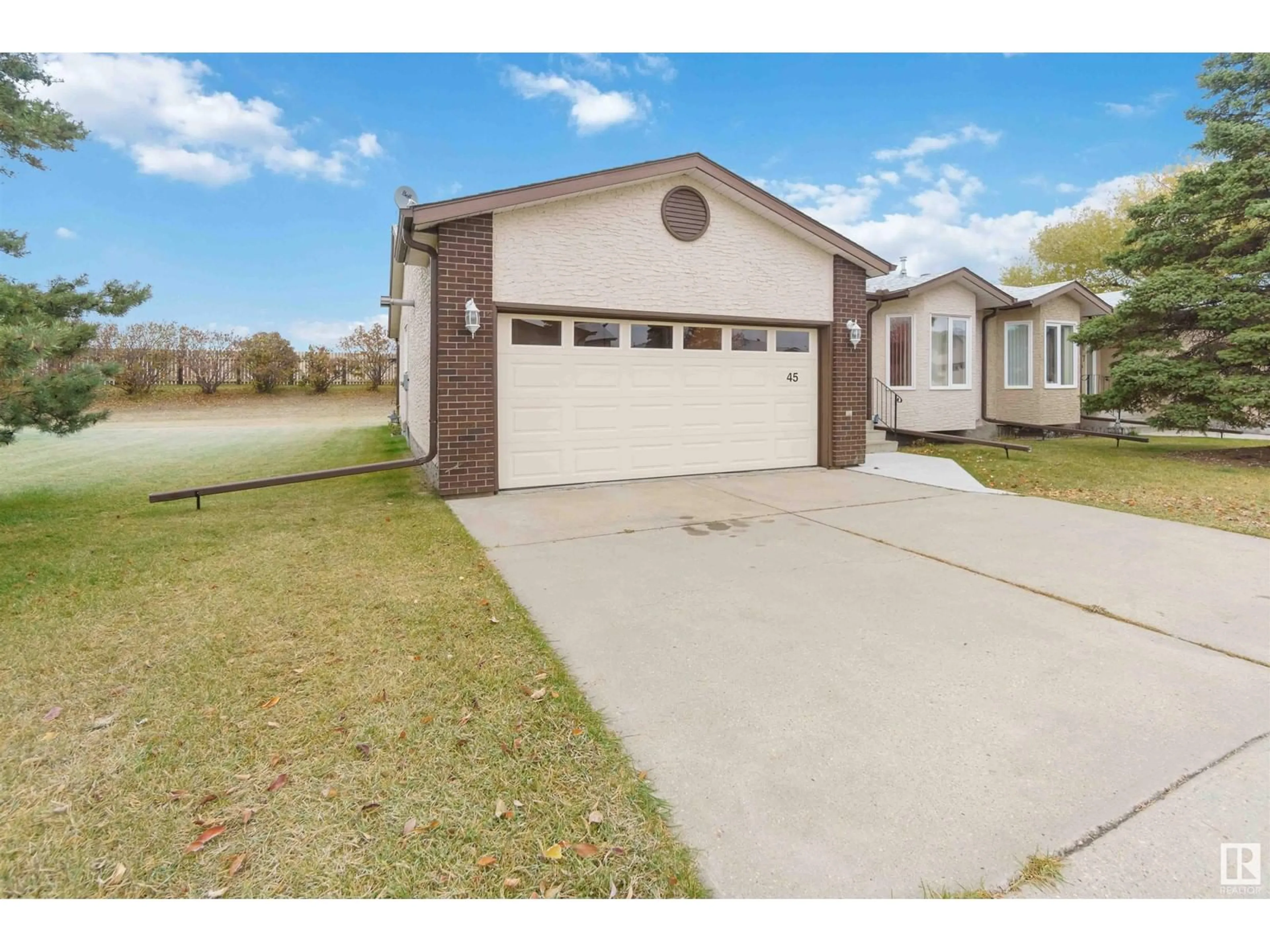 Frontside or backside of a home, the street view for 45 SUNRISE VG, Stony Plain Alberta T7Z1L2