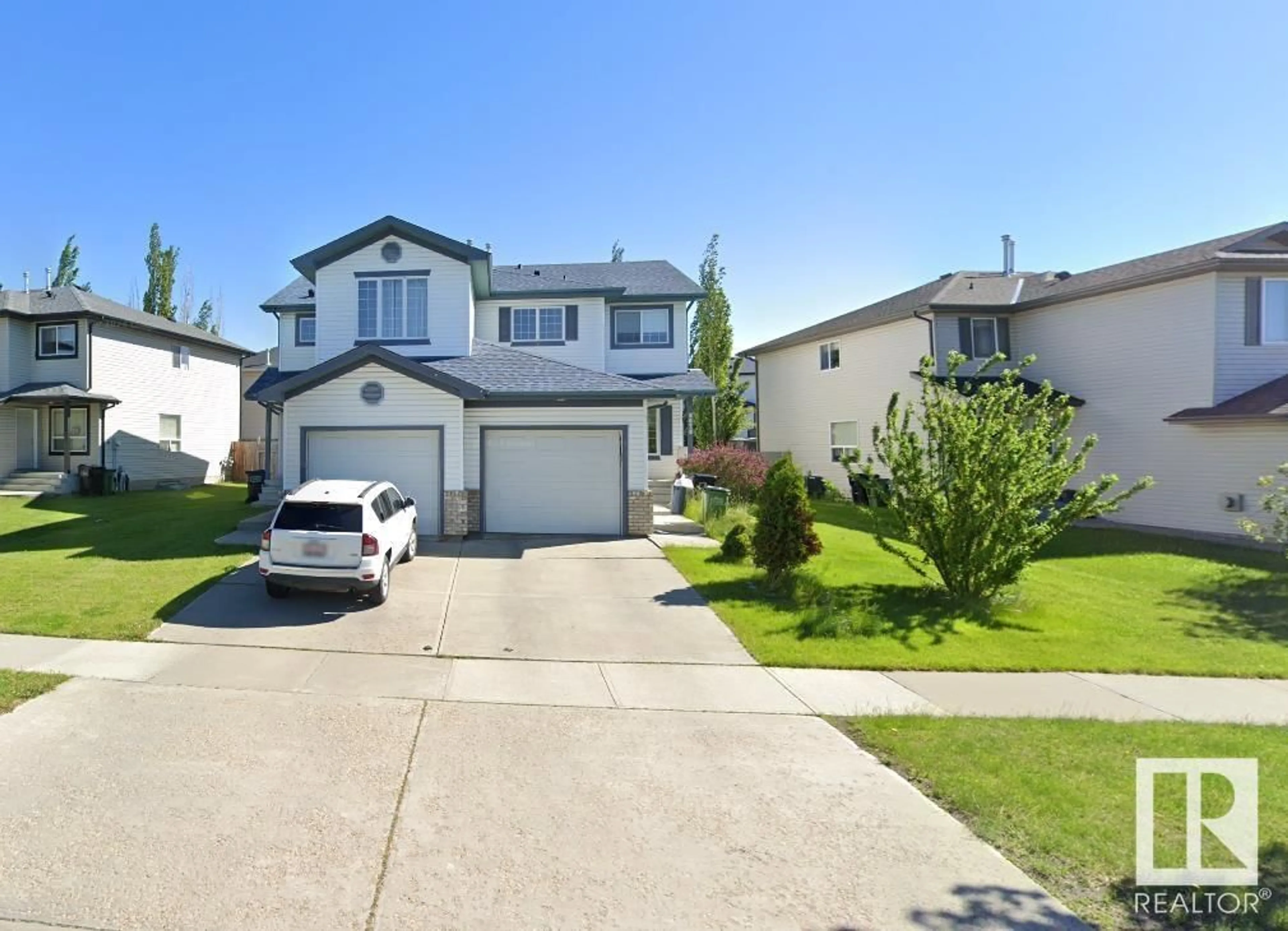 Frontside or backside of a home, the street view for 8628 173 AV NW, Edmonton Alberta T5Z3E4