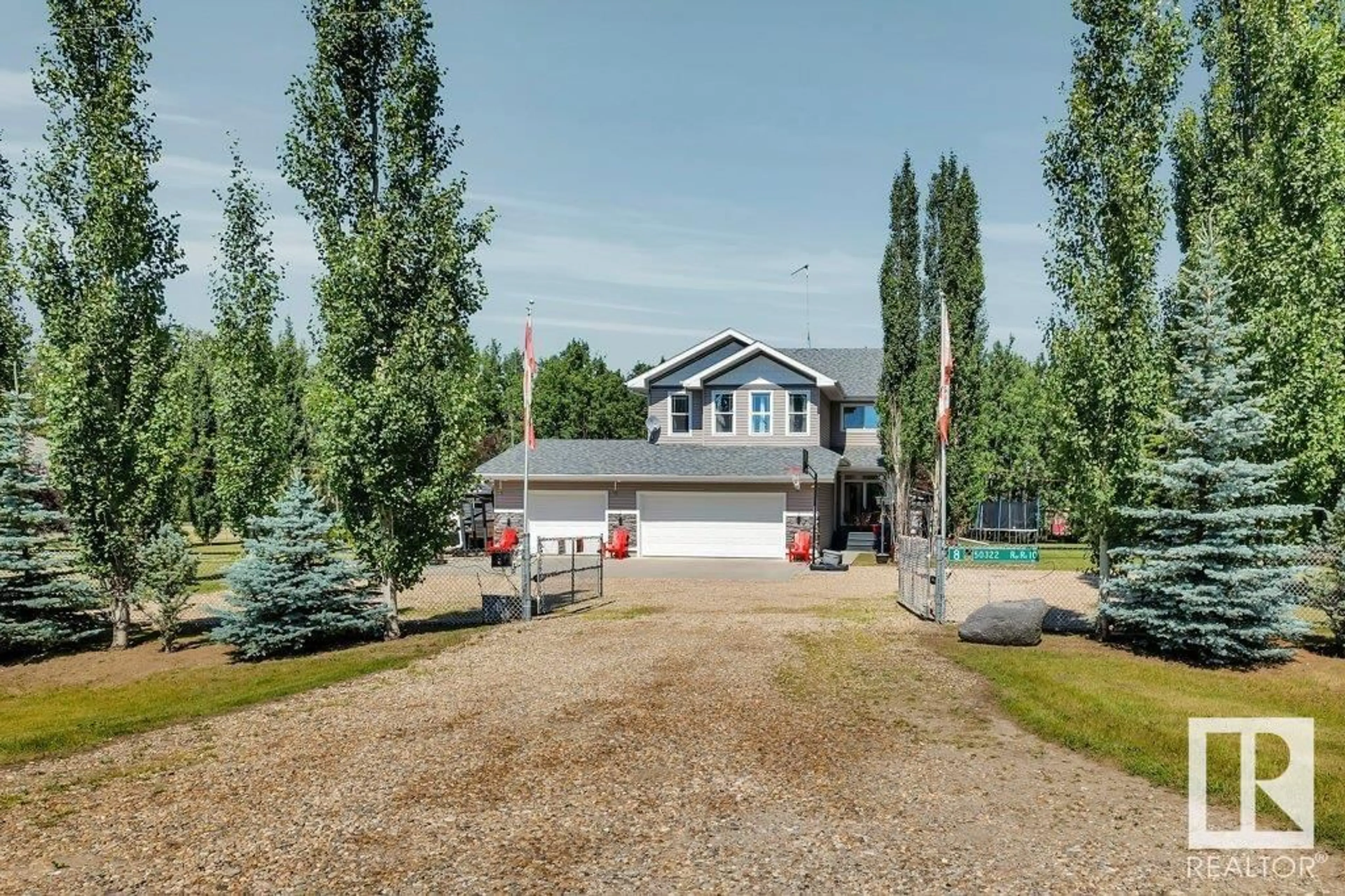 A pic from exterior of the house or condo, the fenced backyard for 50322 RGE RD 10, Rural Parkland County Alberta T7Y2A1