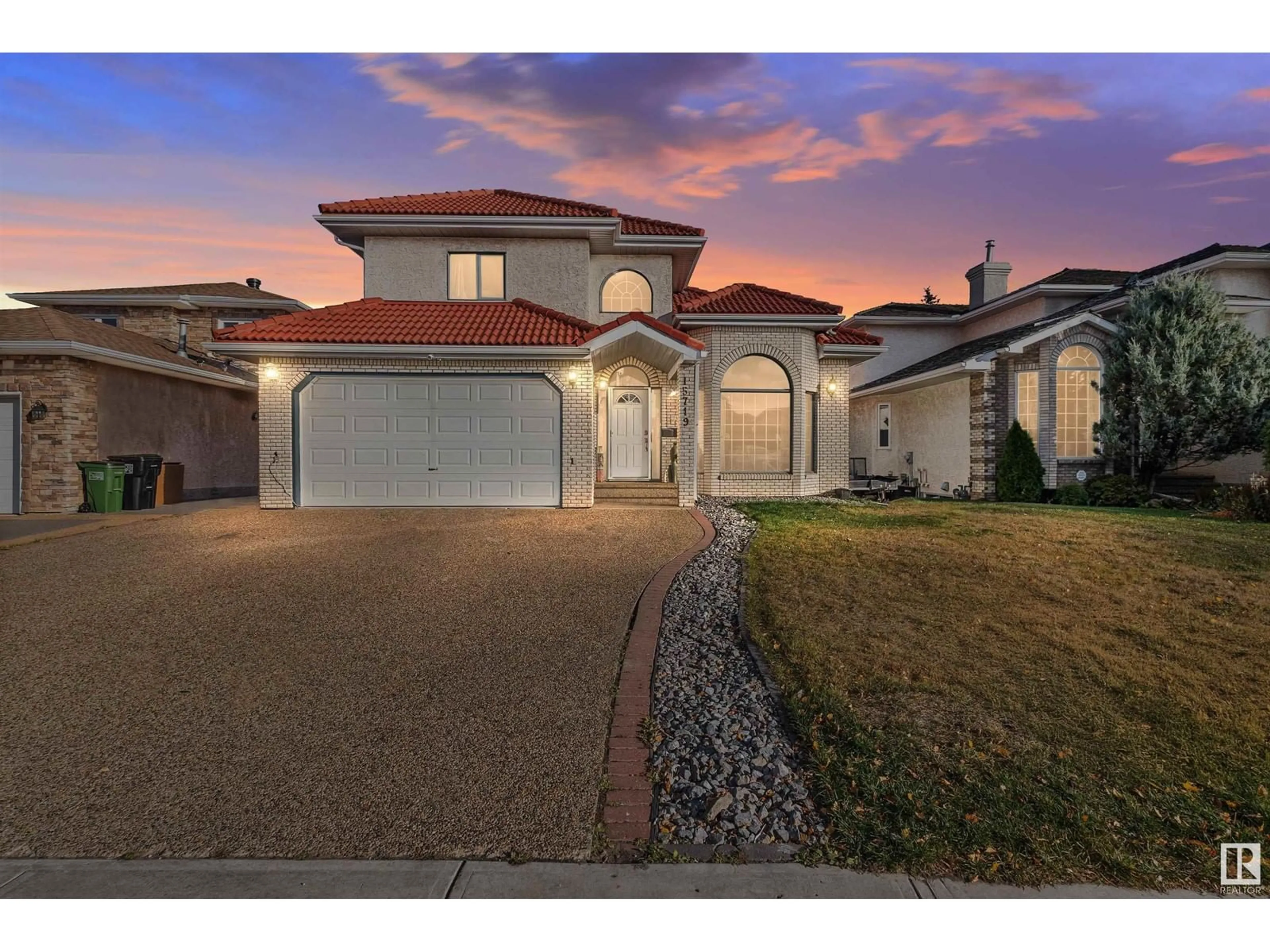 Frontside or backside of a home, the street view for 15719 77 ST NW, Edmonton Alberta T5Z2R8