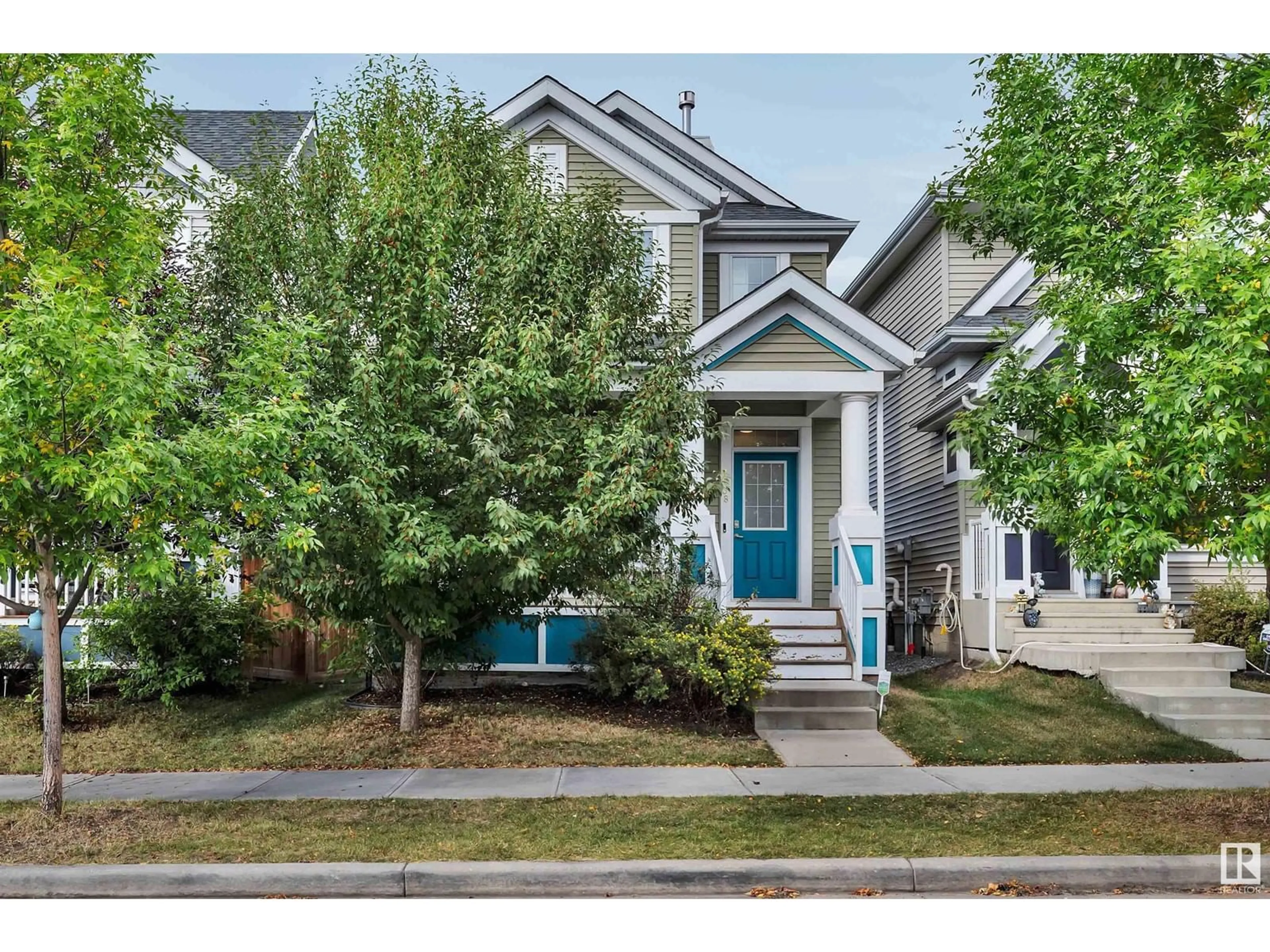 Frontside or backside of a home, the street view for 7038 23 AV SW, Edmonton Alberta T6X1Z1