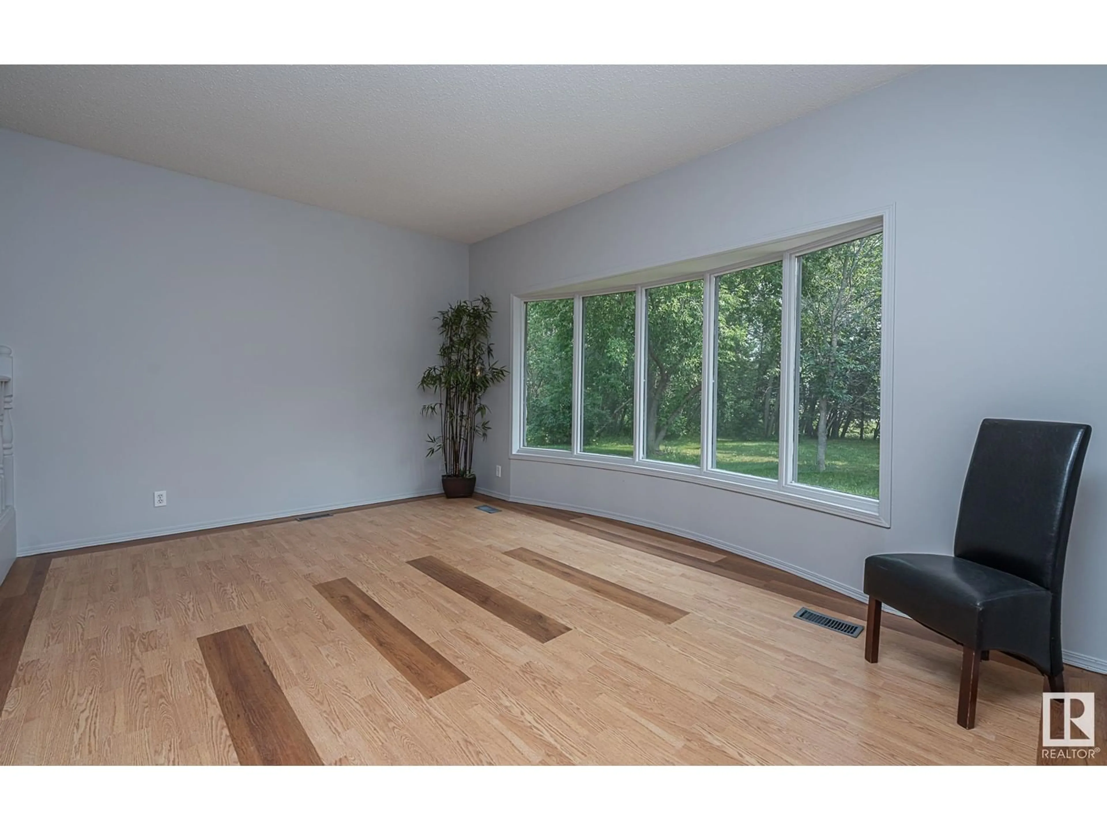 A pic of a room, wood floors for #14 52312 RGE RD 220, Rural Strathcona County Alberta T8C1E1