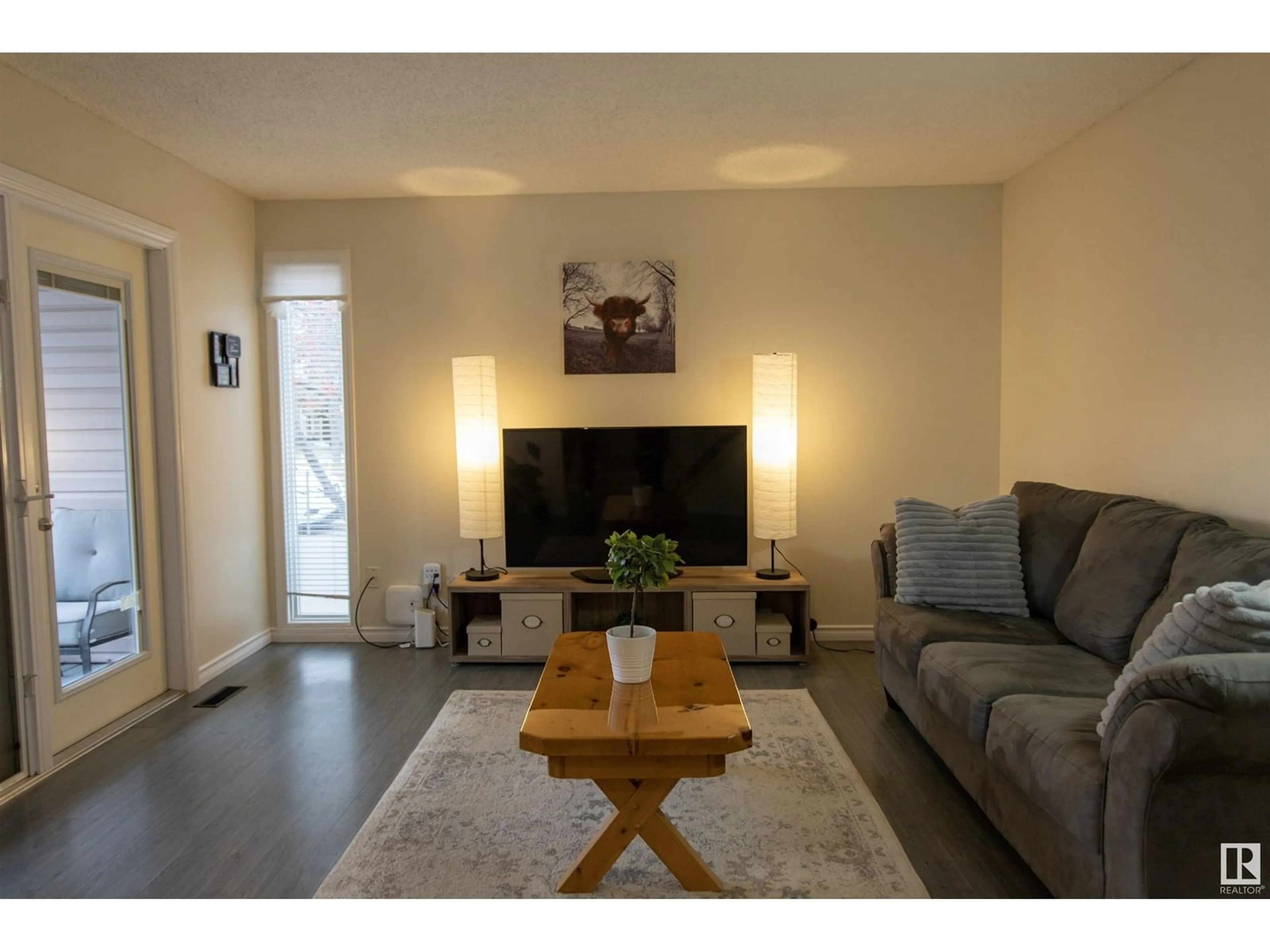 Living room, wood floors for 14650 25 ST NW, Edmonton Alberta T5Y1X4