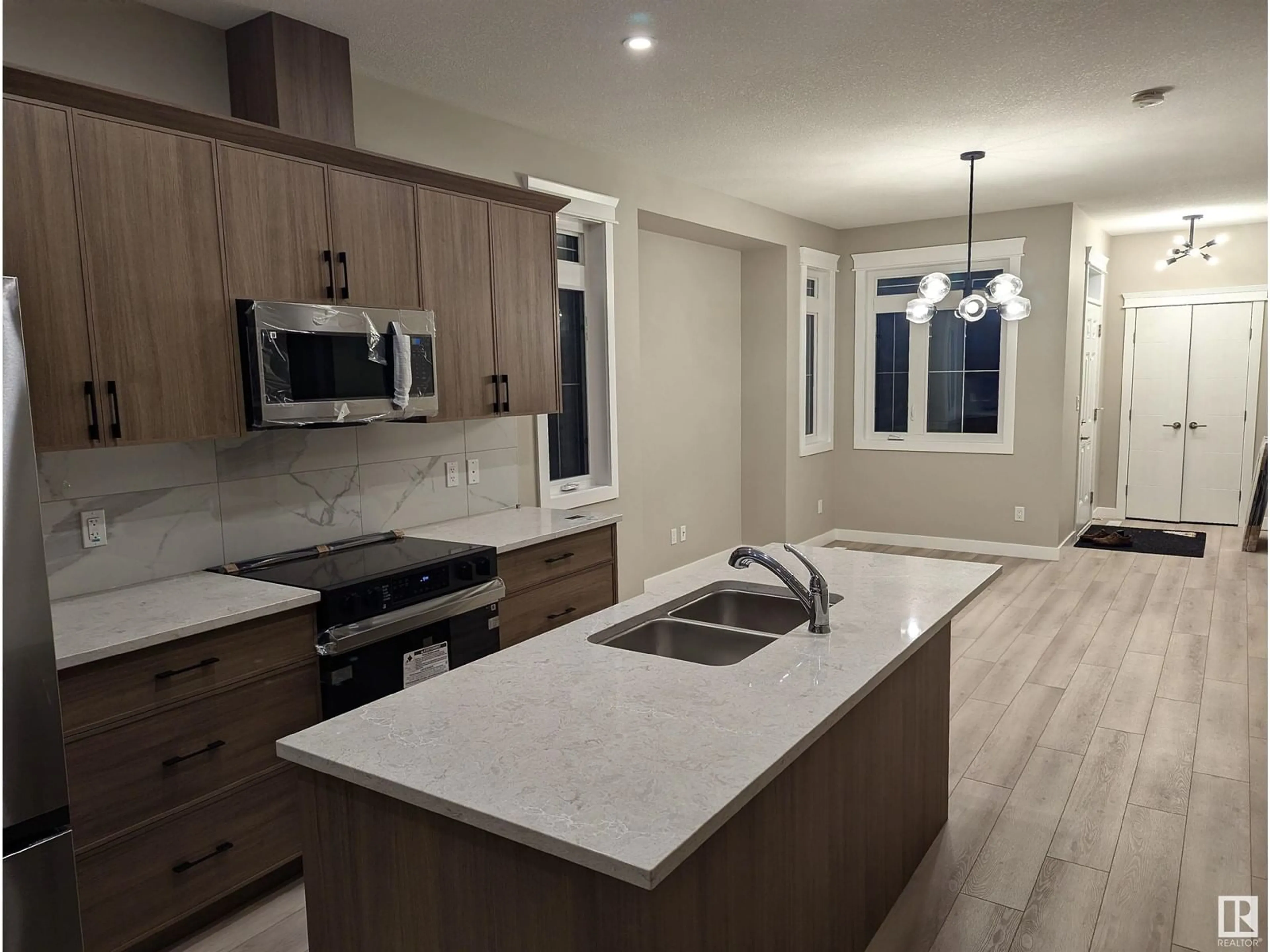 Open concept kitchen for 6014 Naden LD NW, Edmonton Alberta T5E6X6