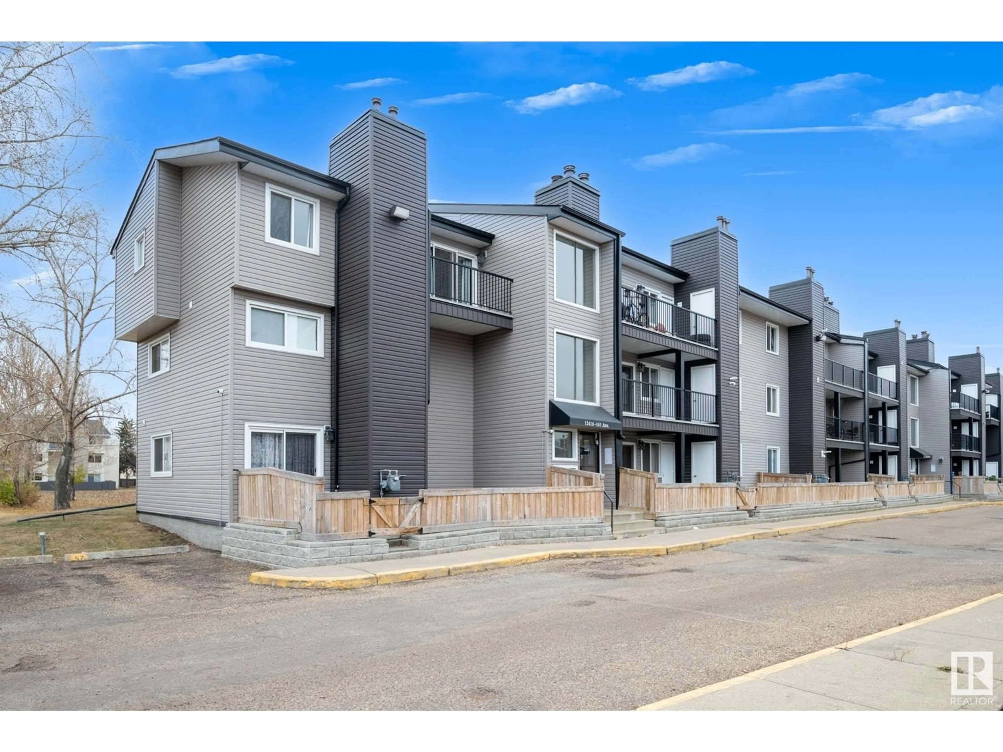 A pic from exterior of the house or condo, the front or back of building for #111 12416 161 AV NW, Edmonton Alberta T5X4W6