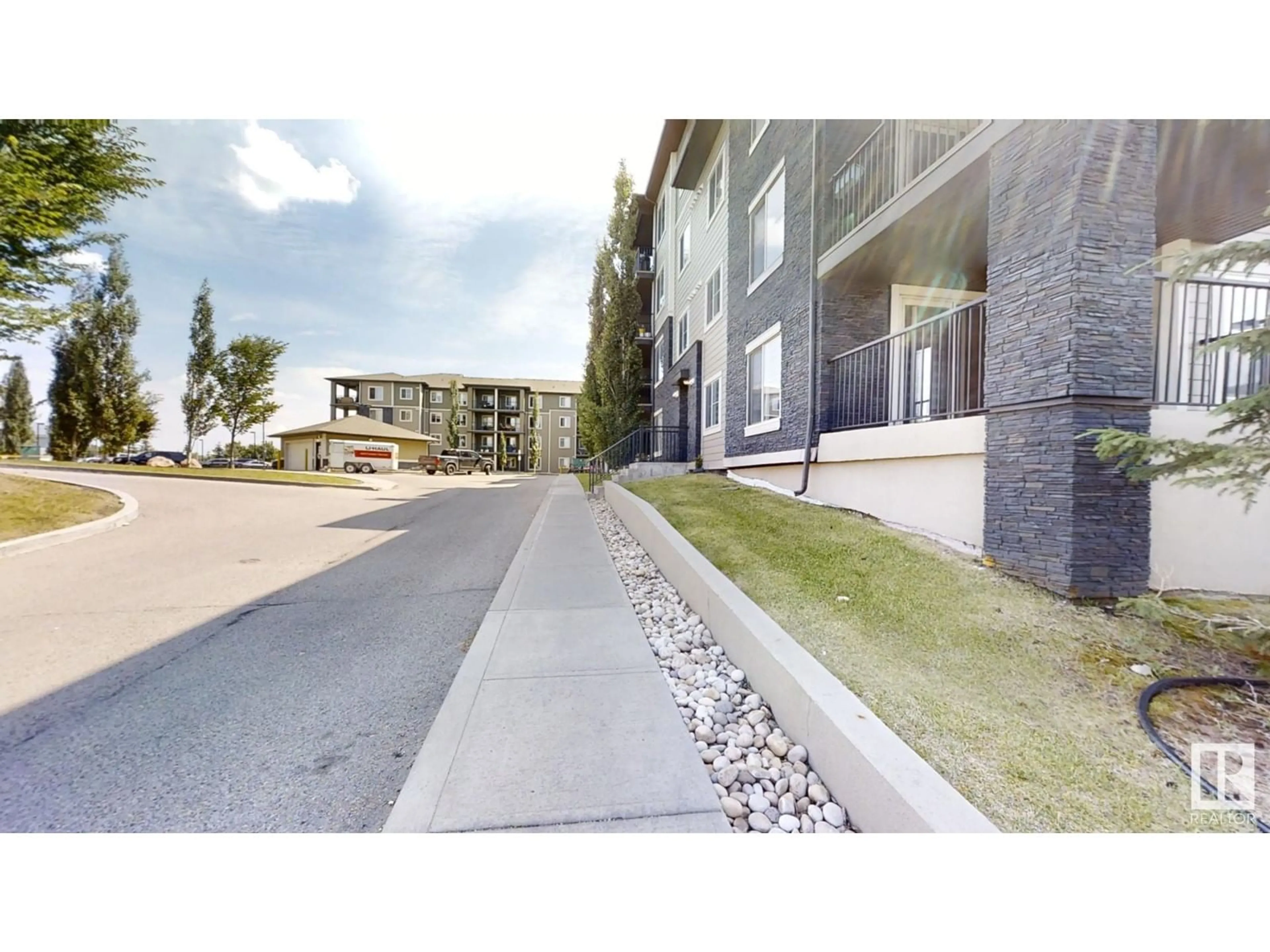 A pic from exterior of the house or condo, the street view for #214 111 Watt Common SW, Edmonton Alberta T6X1C6