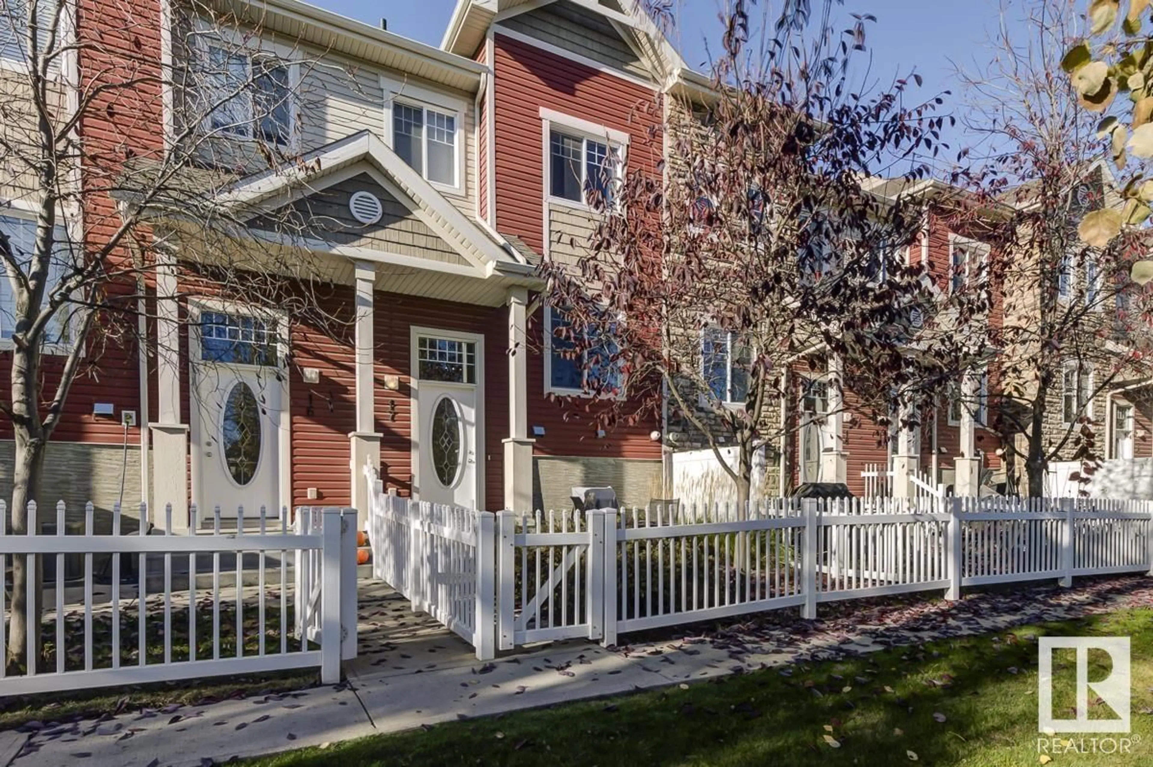 A pic from exterior of the house or condo, the fenced backyard for #17 460 HEMINGWAY RD NW, Edmonton Alberta T6M0M5