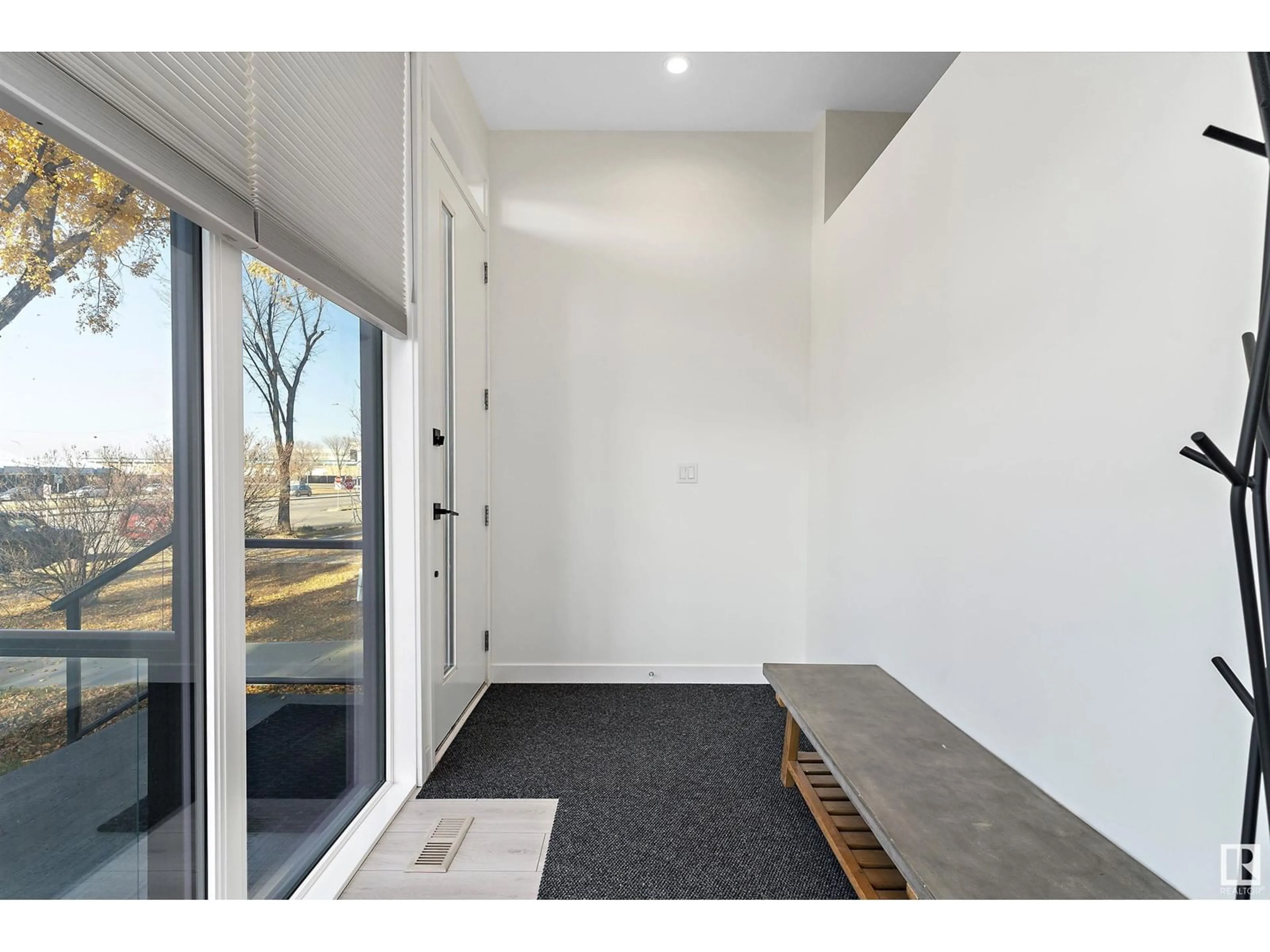 Indoor entryway, cement floor for 12143 107 ST NW, Edmonton Alberta T5G2S8