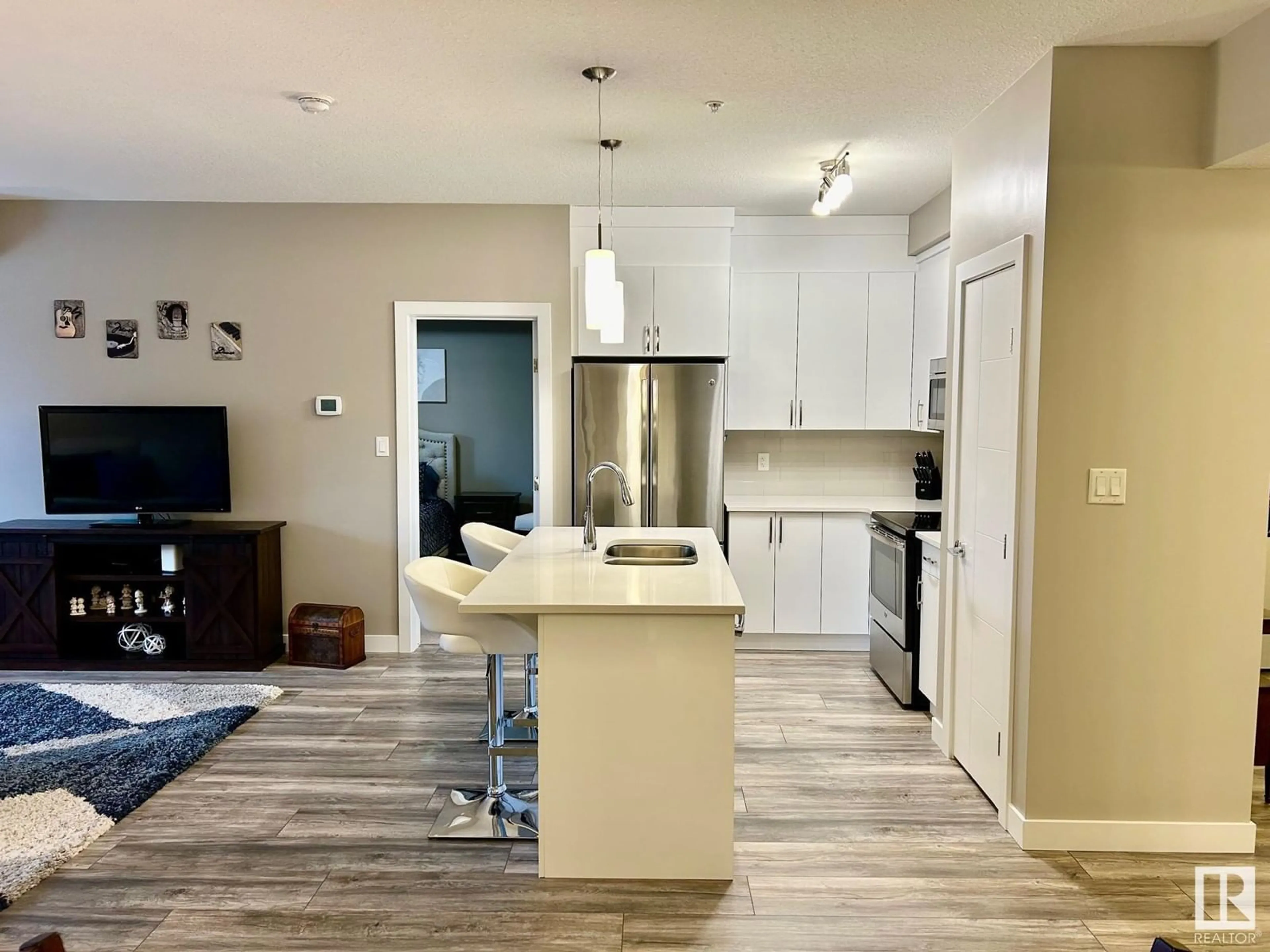 Open concept kitchen for #307 8525 91 ST NW, Edmonton Alberta T6C3N1