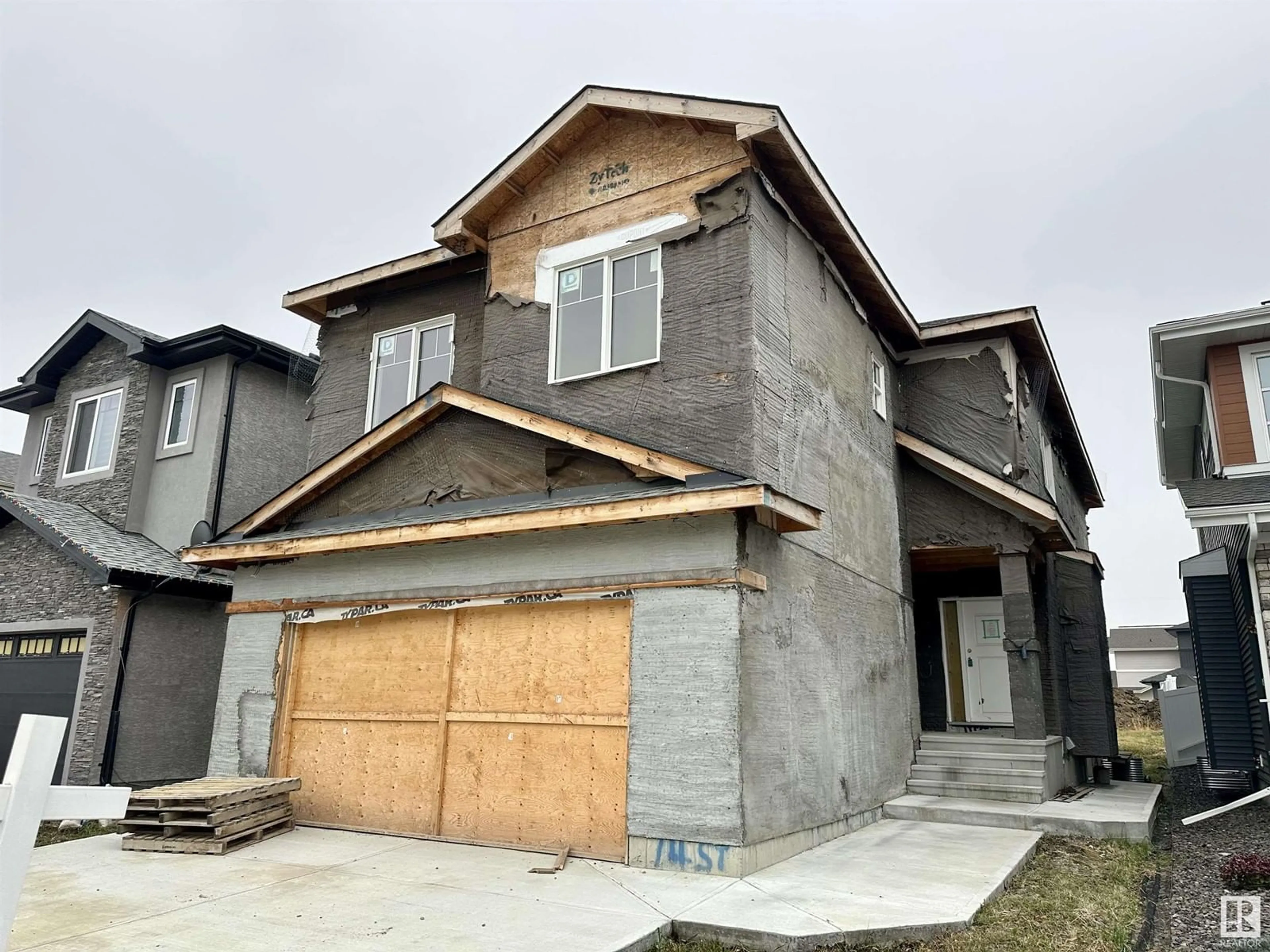 Frontside or backside of a home, the front or back of building for 15108 14 ST NW, Edmonton Alberta T5Y6C4