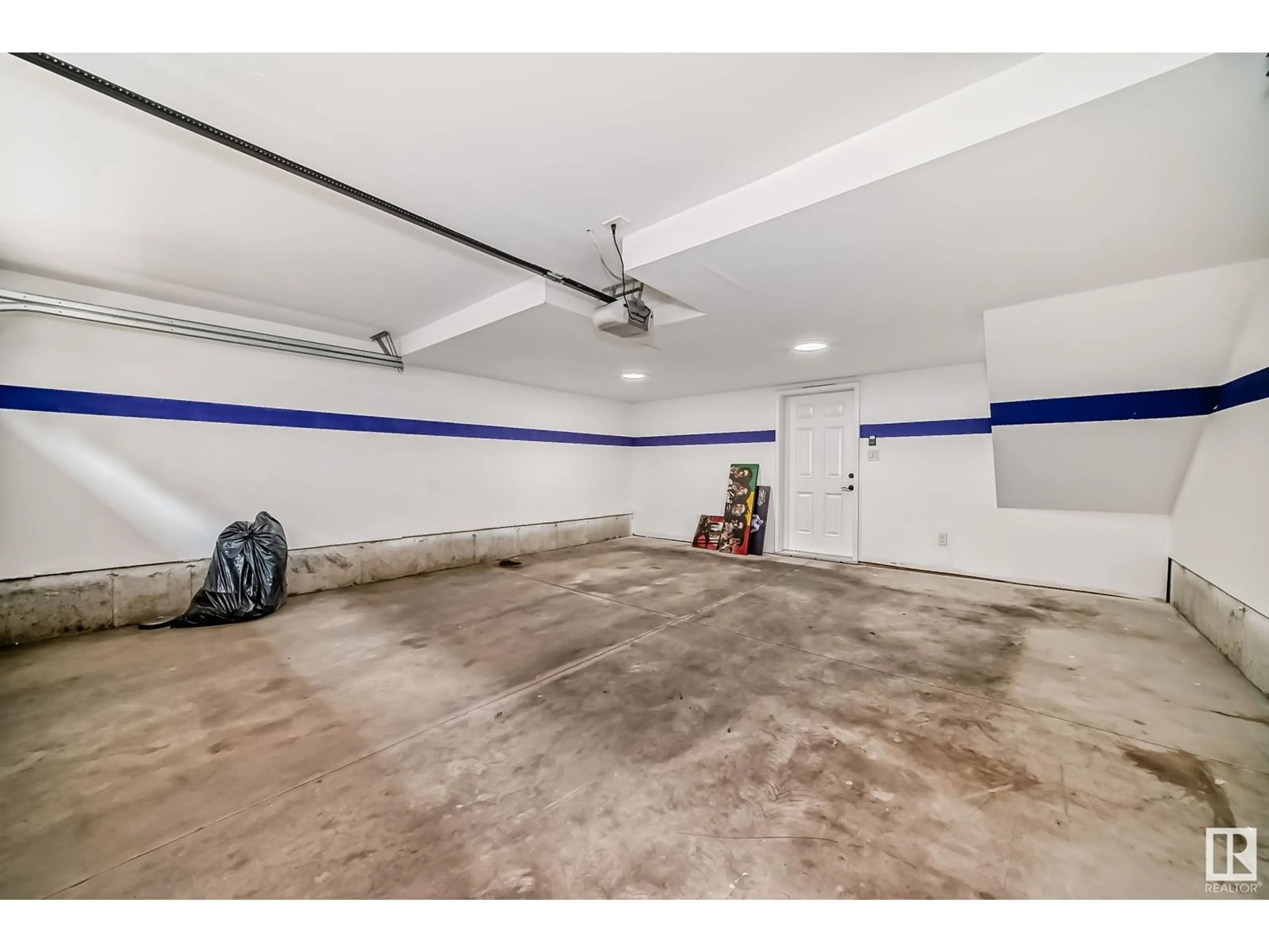 Indoor garage, unknown floor for #13 2803 14 AV NW, Edmonton Alberta T6T2K4