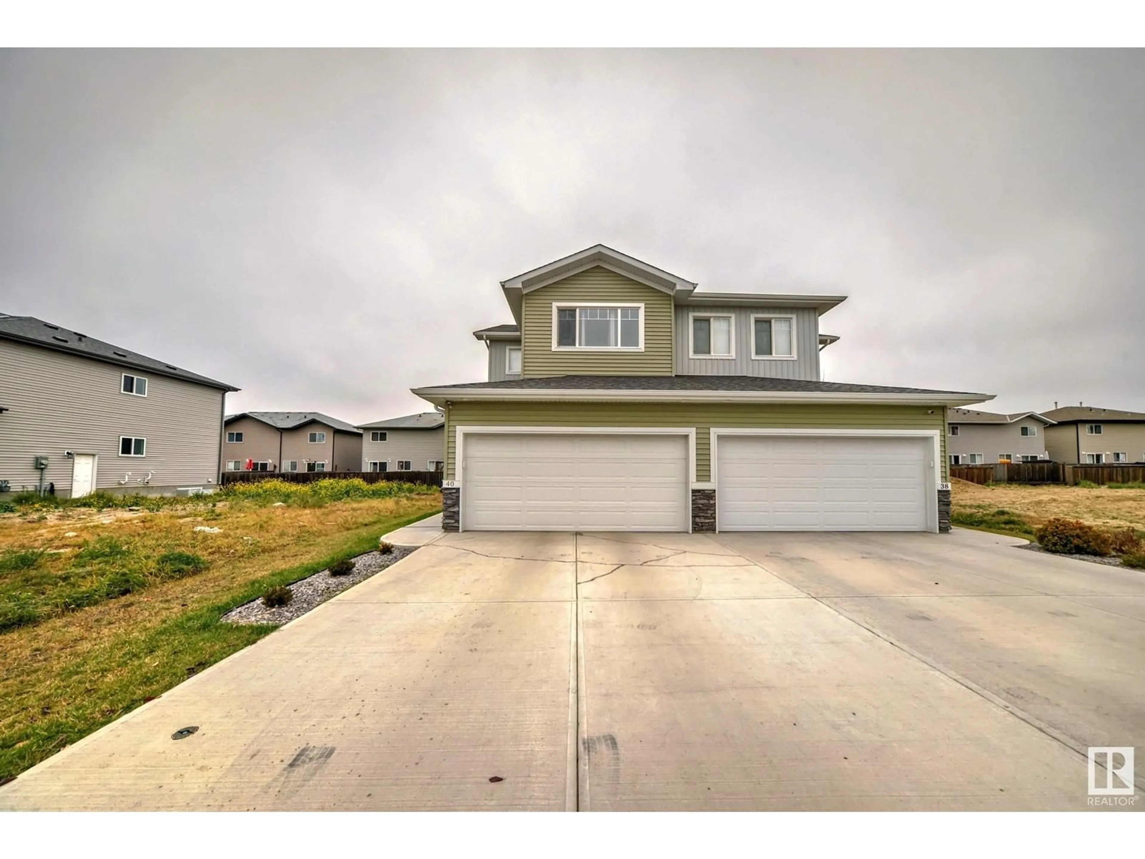 Frontside or backside of a home, the street view for 40 HAMMETT GA, Spruce Grove Alberta T7X0V2