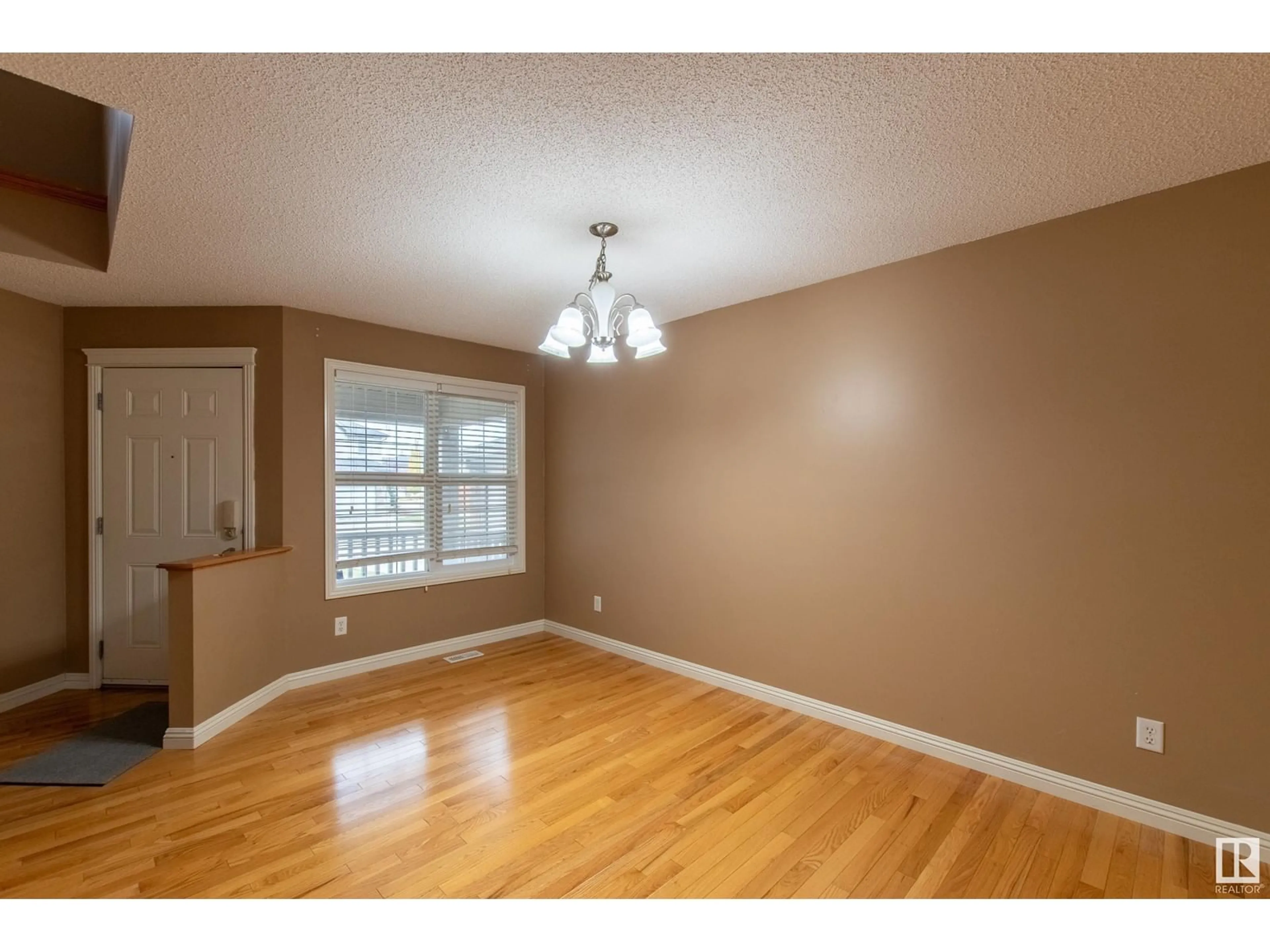 A pic of a room, wood floors for 2410 HAGEN WY NW, Edmonton Alberta T6R3M6