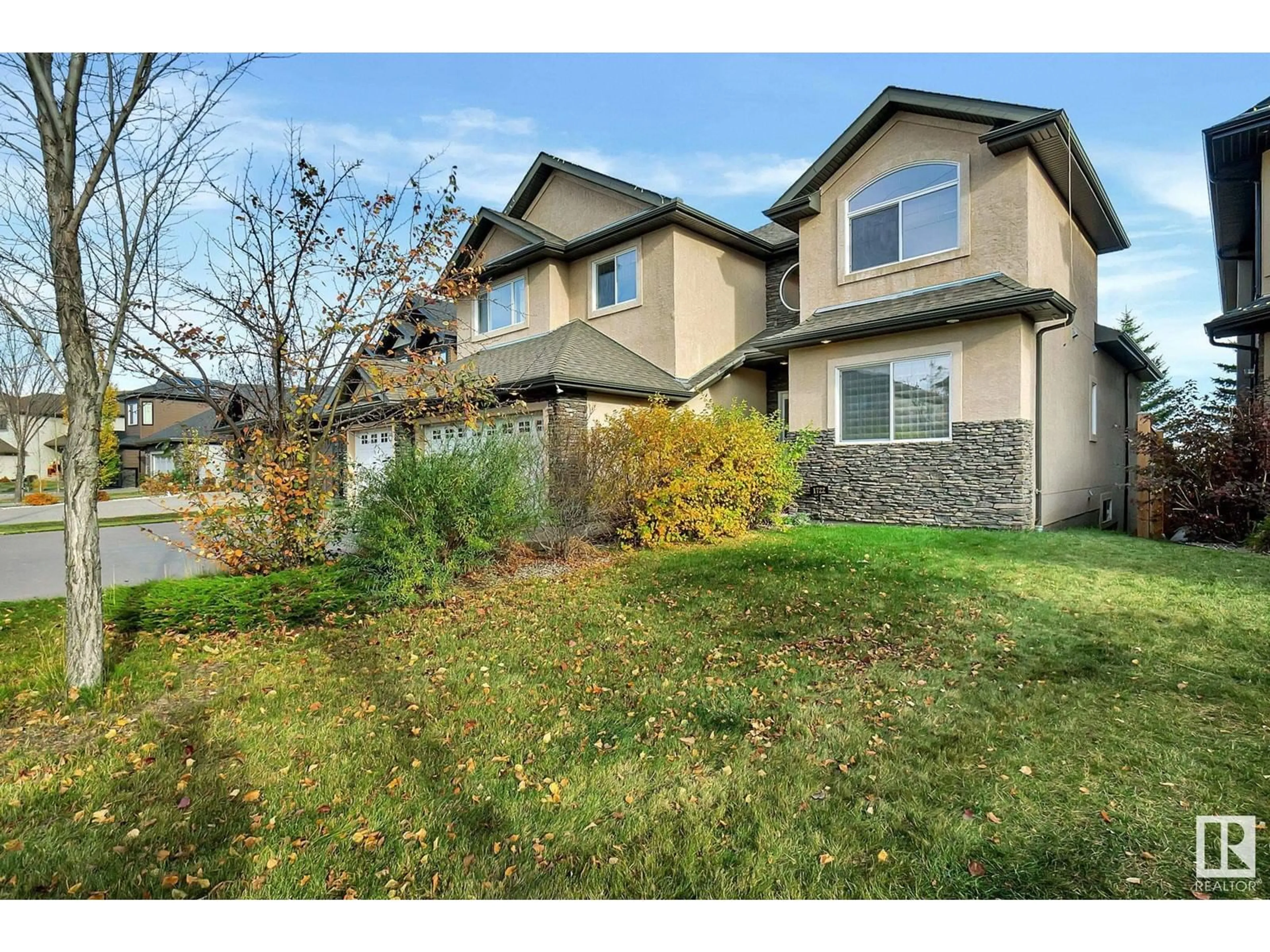 A pic from exterior of the house or condo, the fenced backyard for 1722 ADAMSON CR SW, Edmonton Alberta T6W1Z4