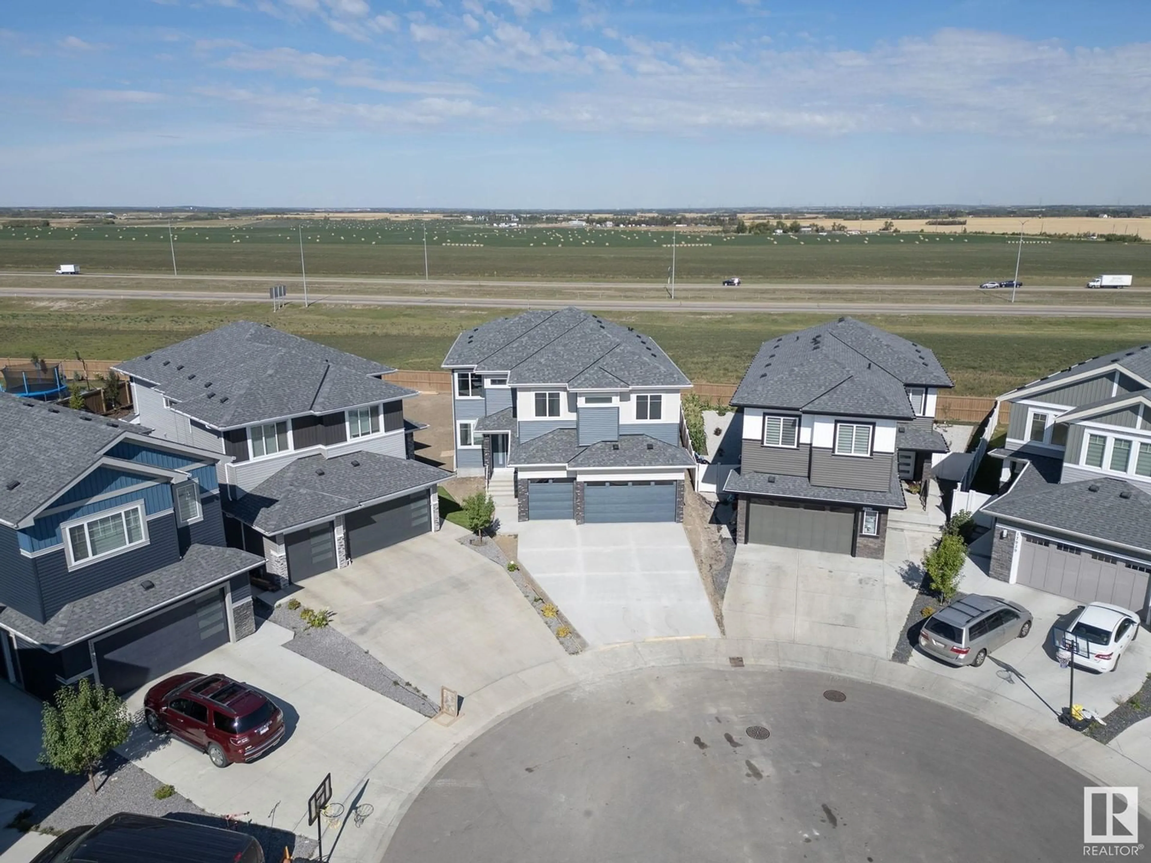 Frontside or backside of a home, the street view for 17940 59 ST NW, Edmonton Alberta T5Y3W8