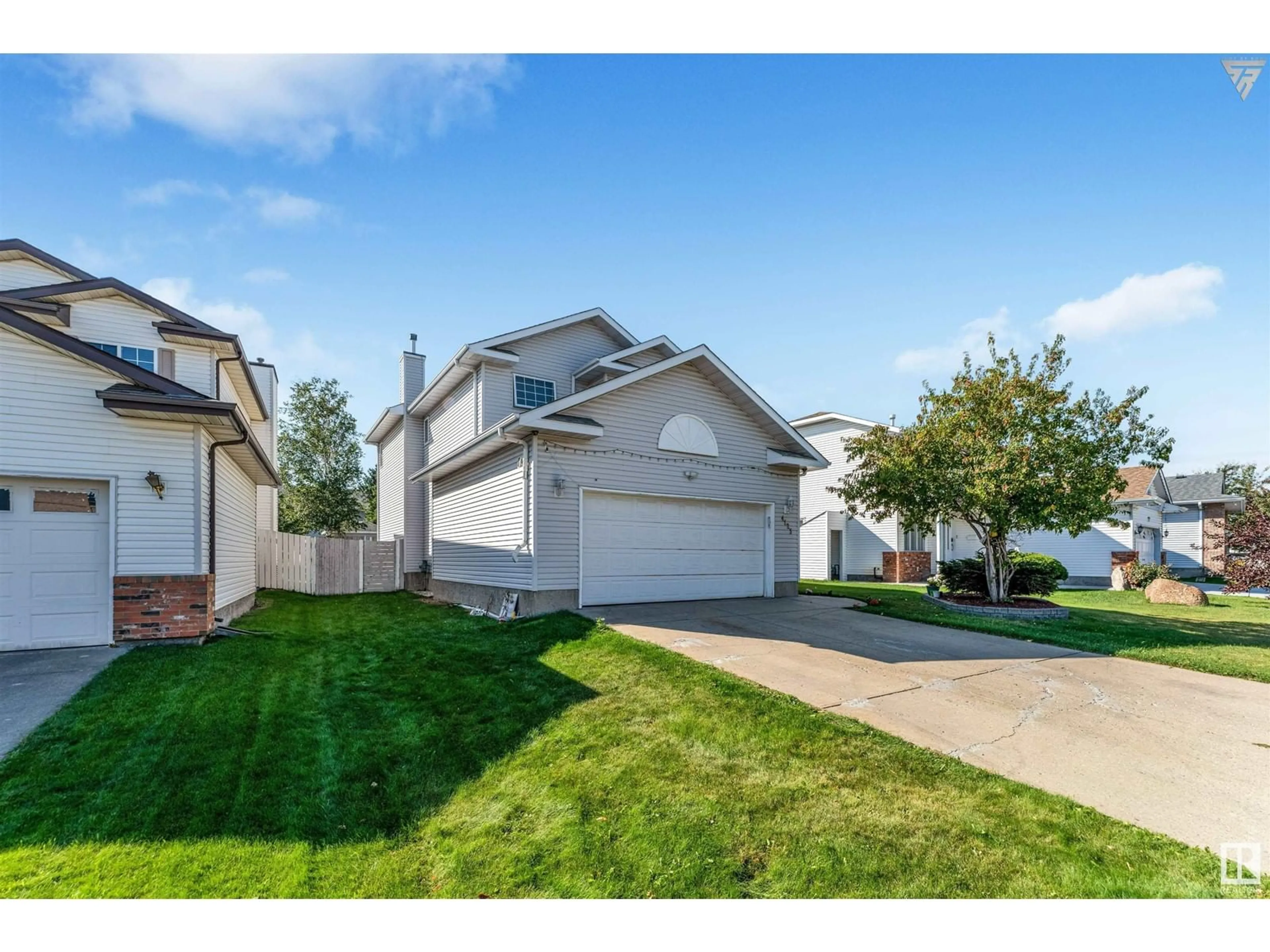 Frontside or backside of a home, the fenced backyard for 4123 22 AV NW, Edmonton Alberta T6L6L4