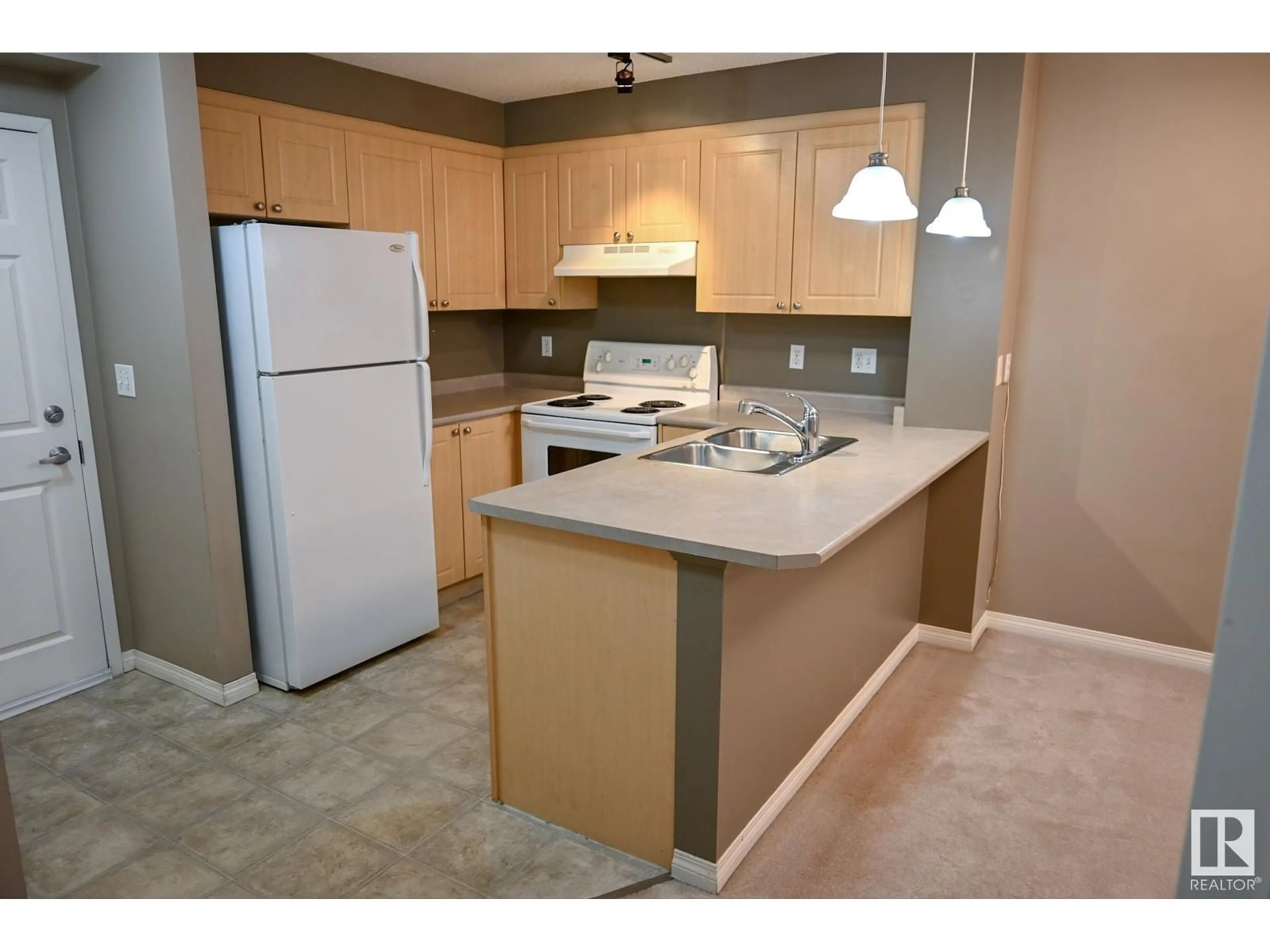 Standard kitchen, carpet floors, cottage for #211 616 MCALLISTER LO SW, Edmonton Alberta T6W1N1