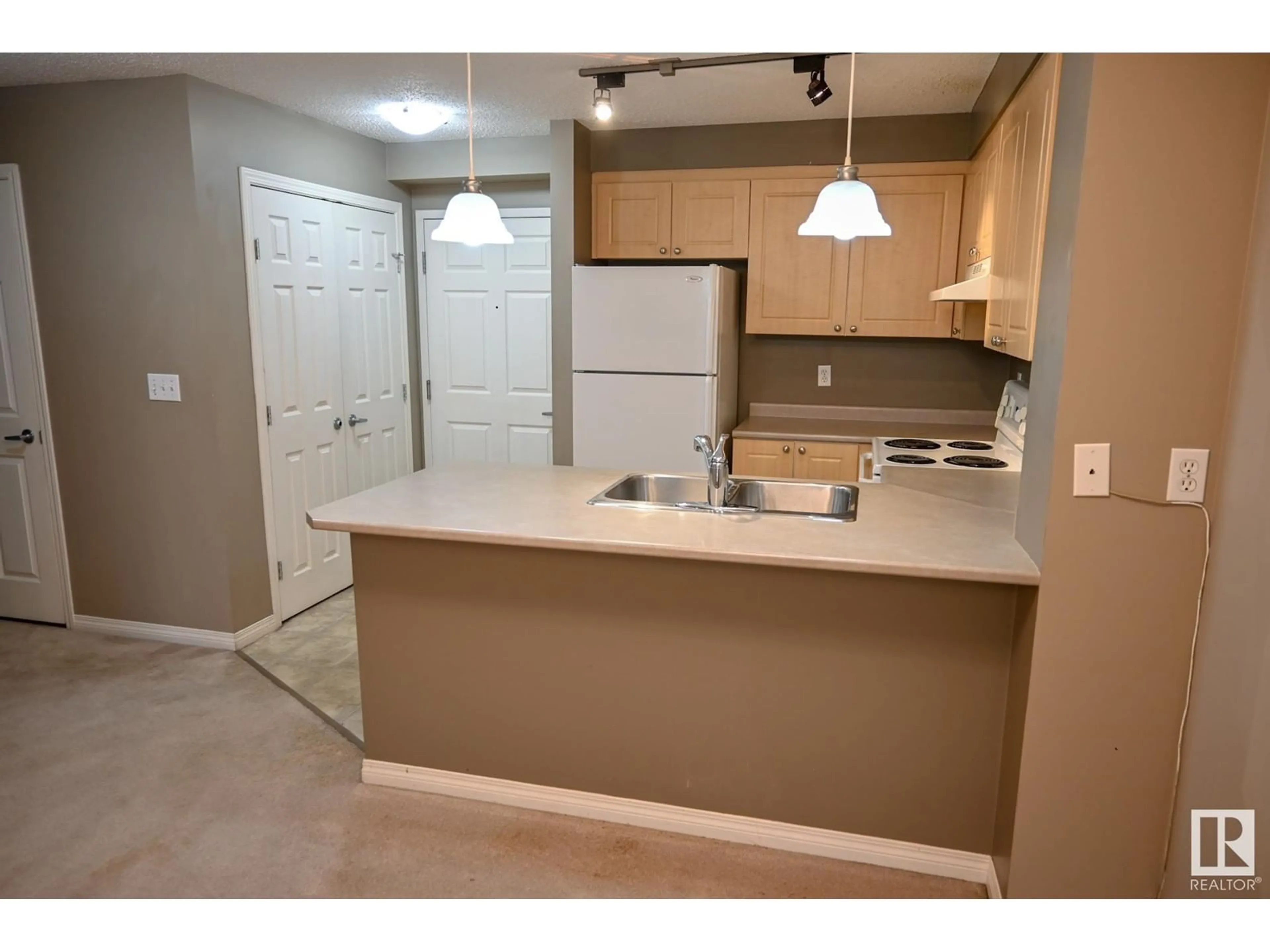 Standard kitchen, cement floor, cottage for #211 616 MCALLISTER LO SW, Edmonton Alberta T6W1N1