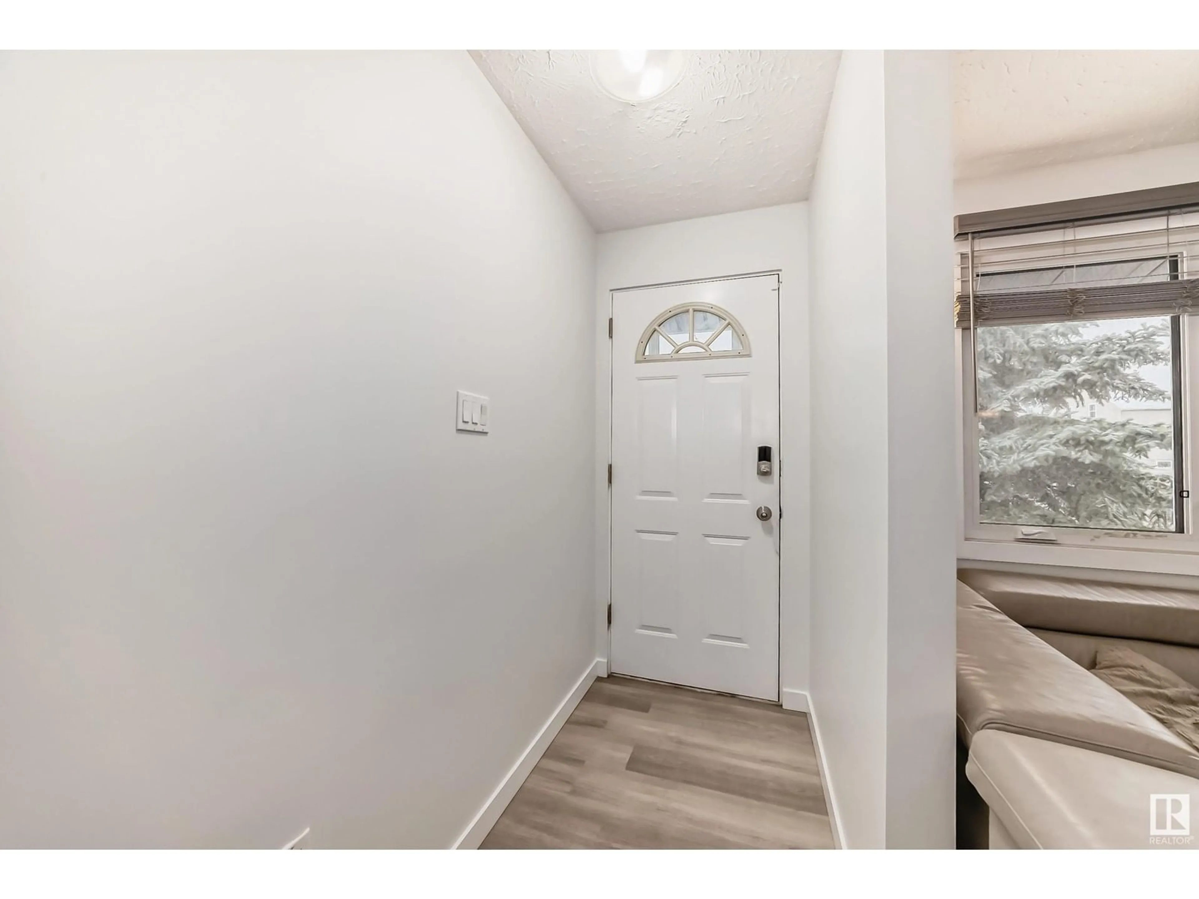 Indoor entryway, wood floors for 13511 127 ST NW, Edmonton Alberta T5L1B8