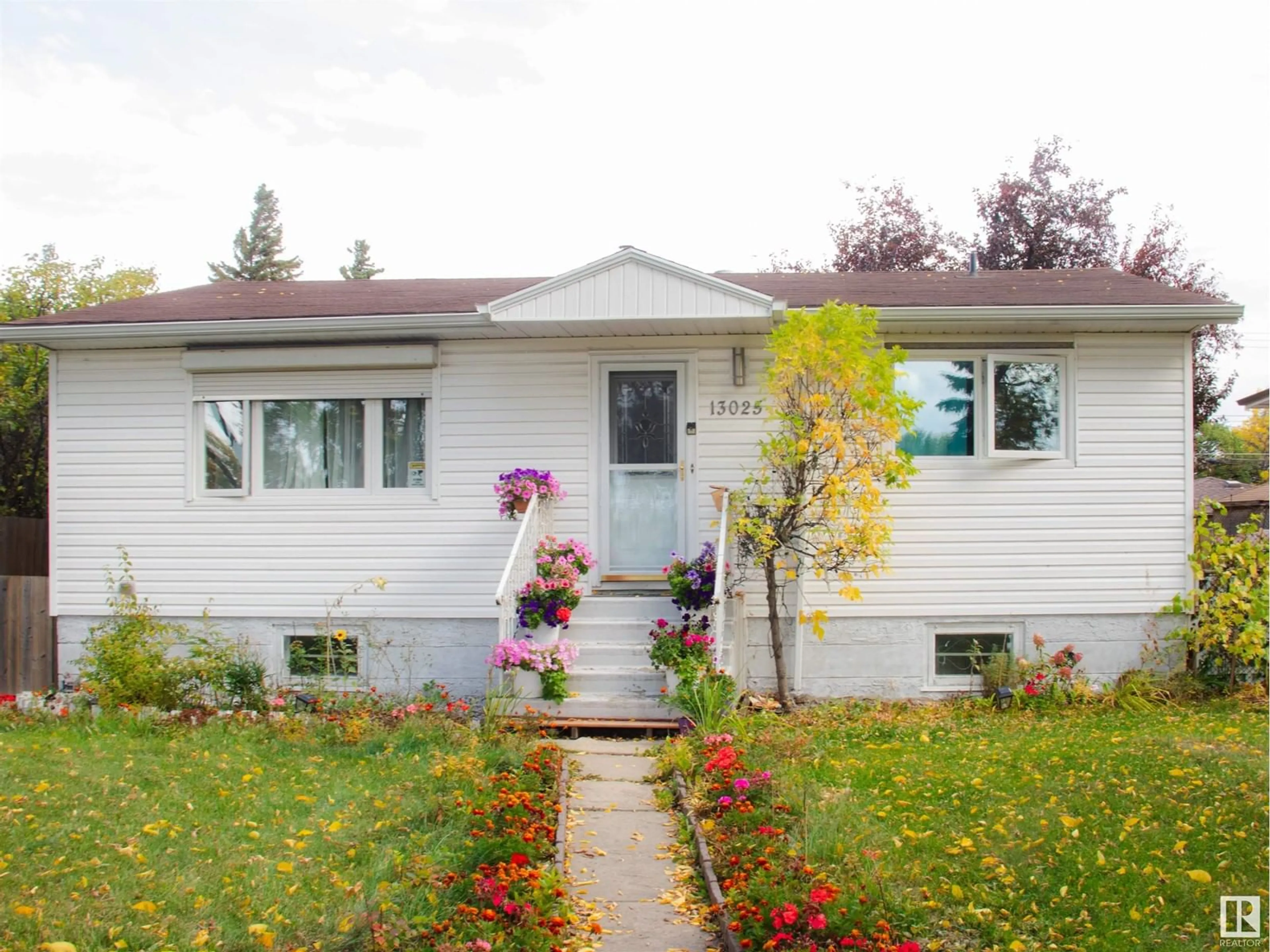 Frontside or backside of a home, cottage for 13025 124 ST NW, Edmonton Alberta T5L0P8