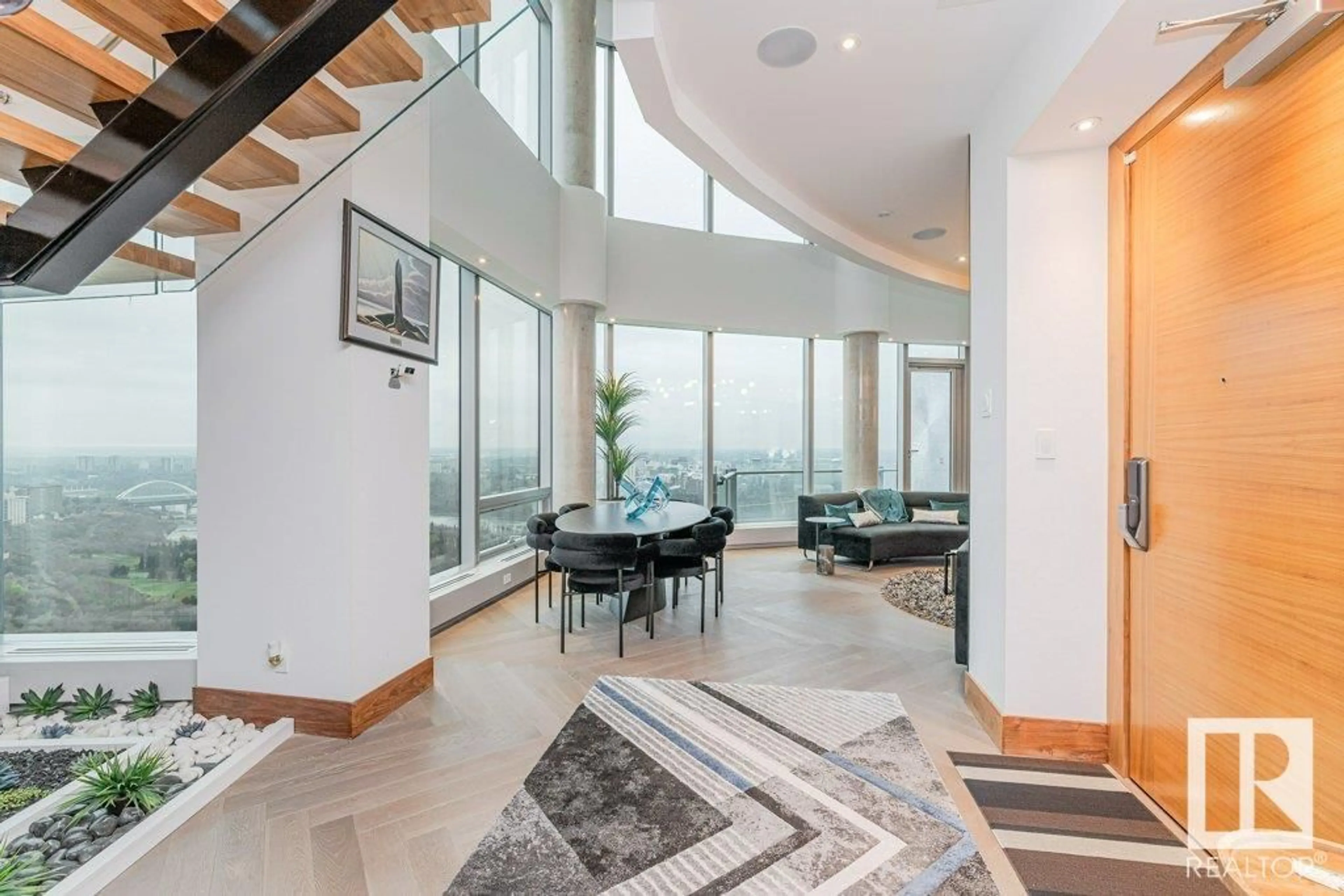 Indoor foyer for 3401 JASPER AV, Edmonton Alberta T5K0P1