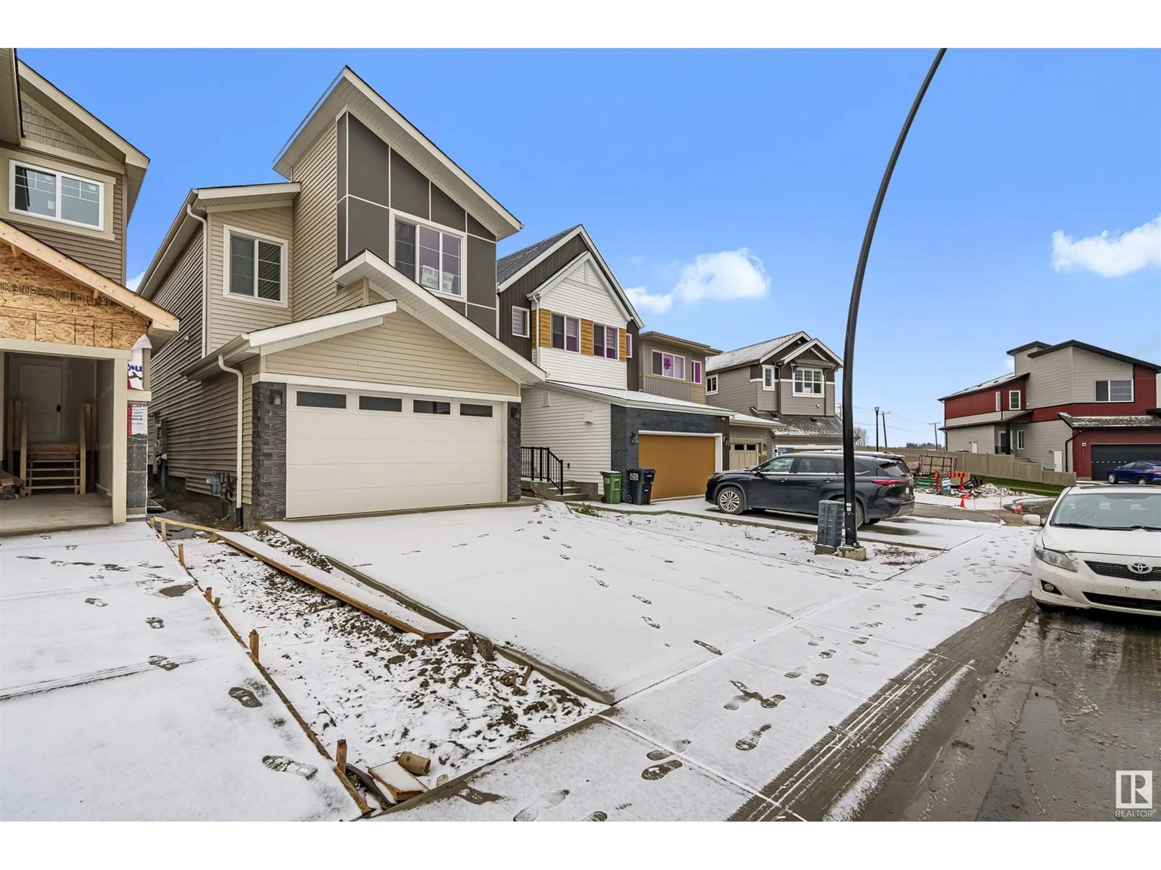 Frontside or backside of a home, the street view for 20759 24 AV NW, Edmonton Alberta T6M2J7