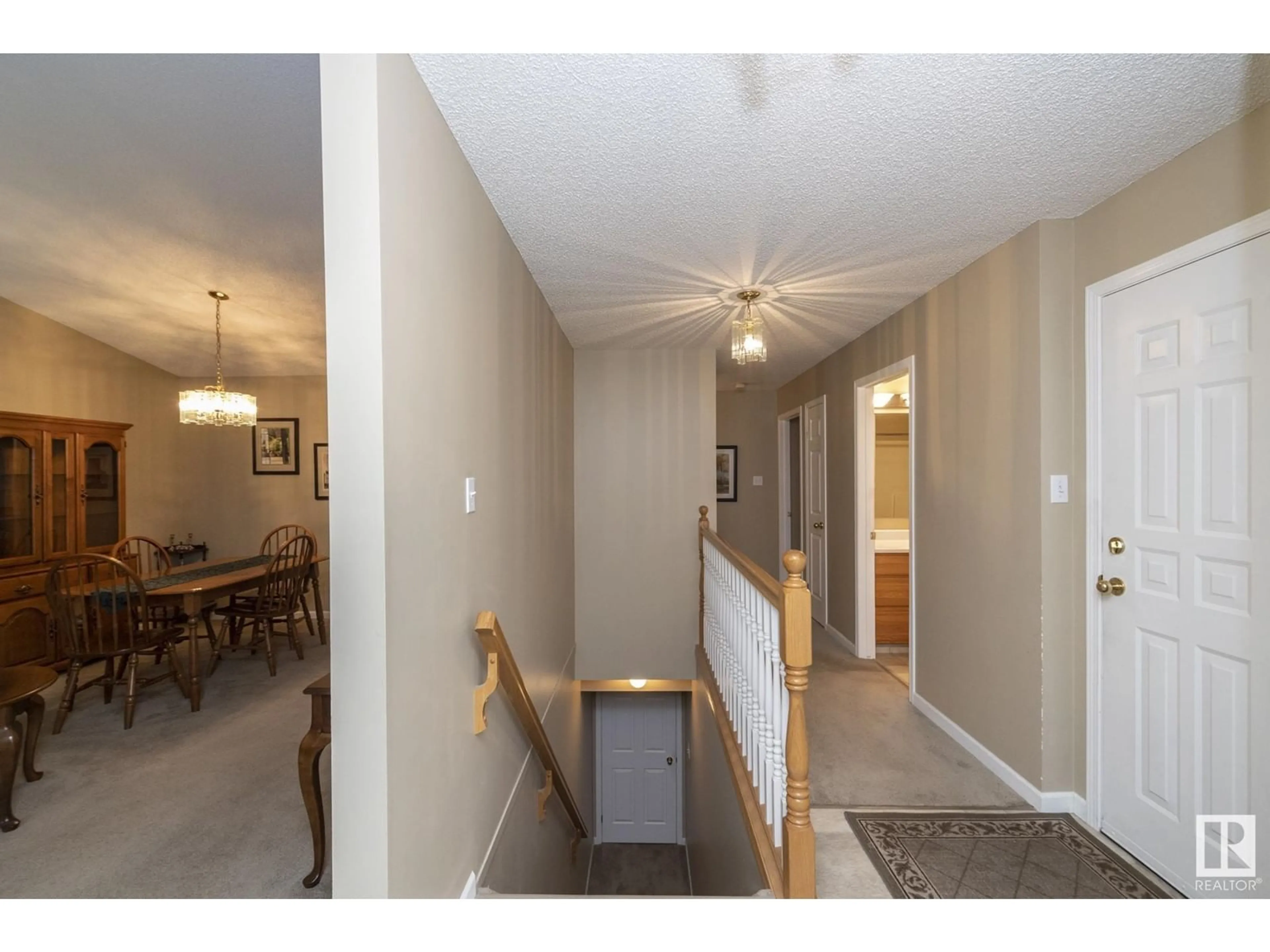 Indoor foyer, wood floors for #2 13217 155 AV NW, Edmonton Alberta T6V1E6