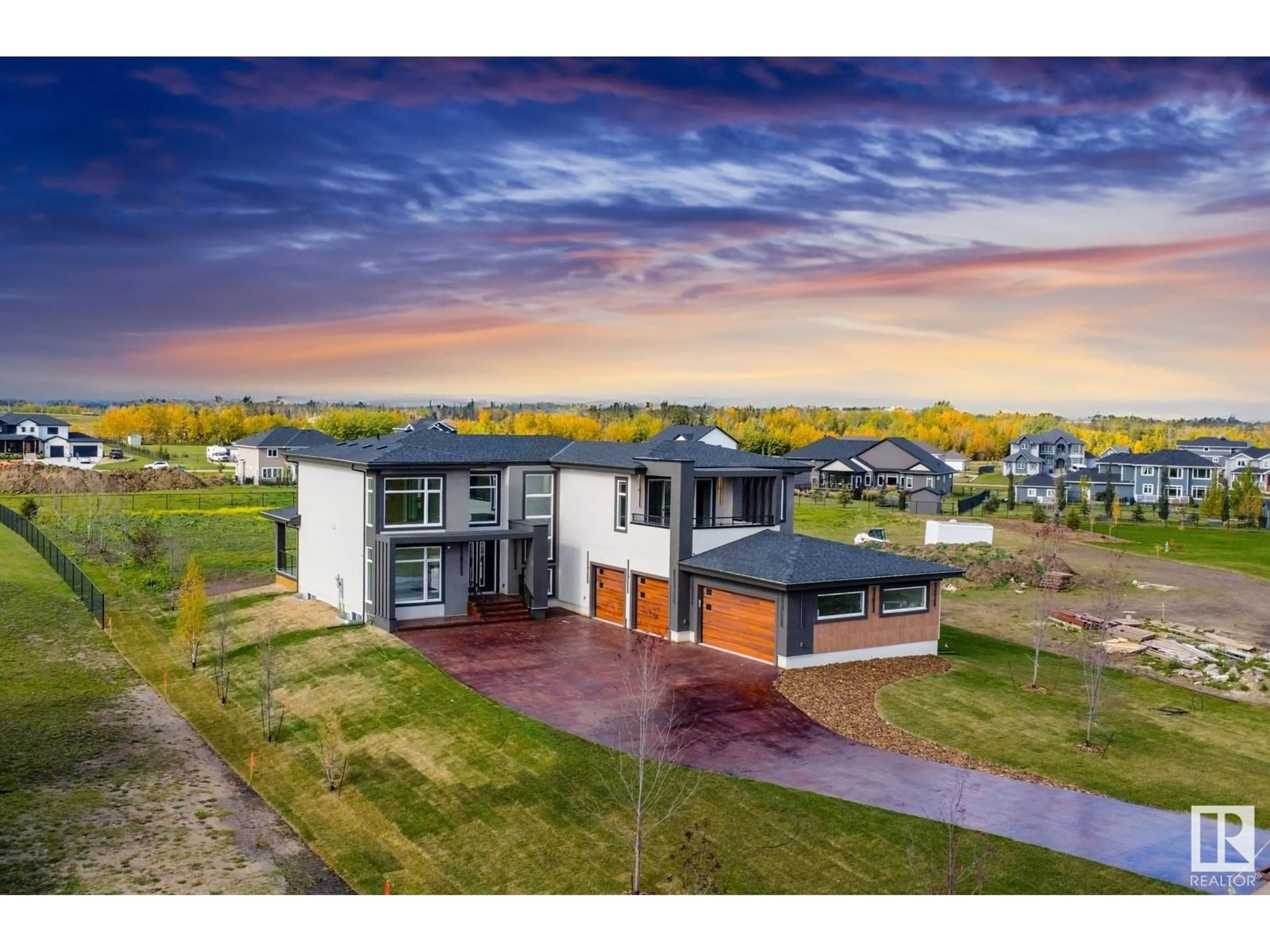 A pic from outside/outdoor area/front of a property/back of a property/a pic from drone, building for 53 26409 TWP RD 532 A, Rural Parkland County Alberta T7X0W7